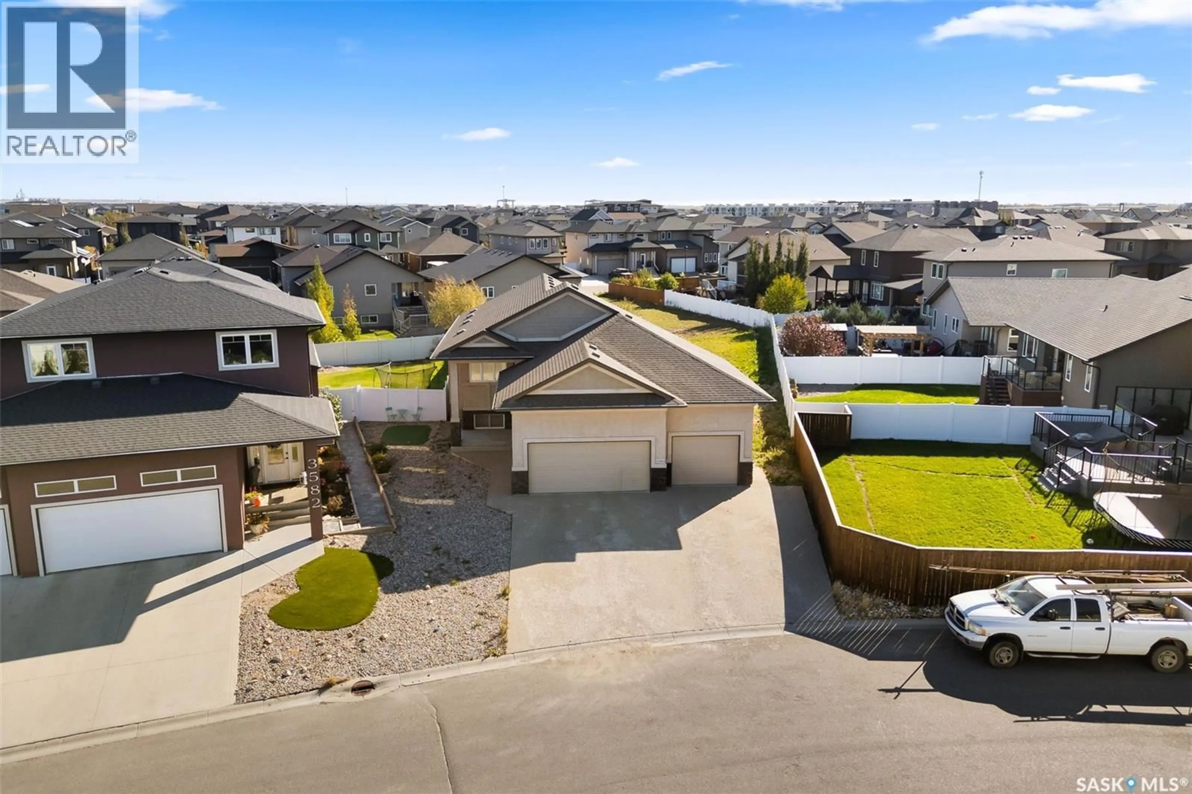 A pic from outside/outdoor area/front of a property/back of a property/a pic from drone, street for 3586 GREEN SPRUCE PLACE, Regina Saskatchewan S4V1R5
