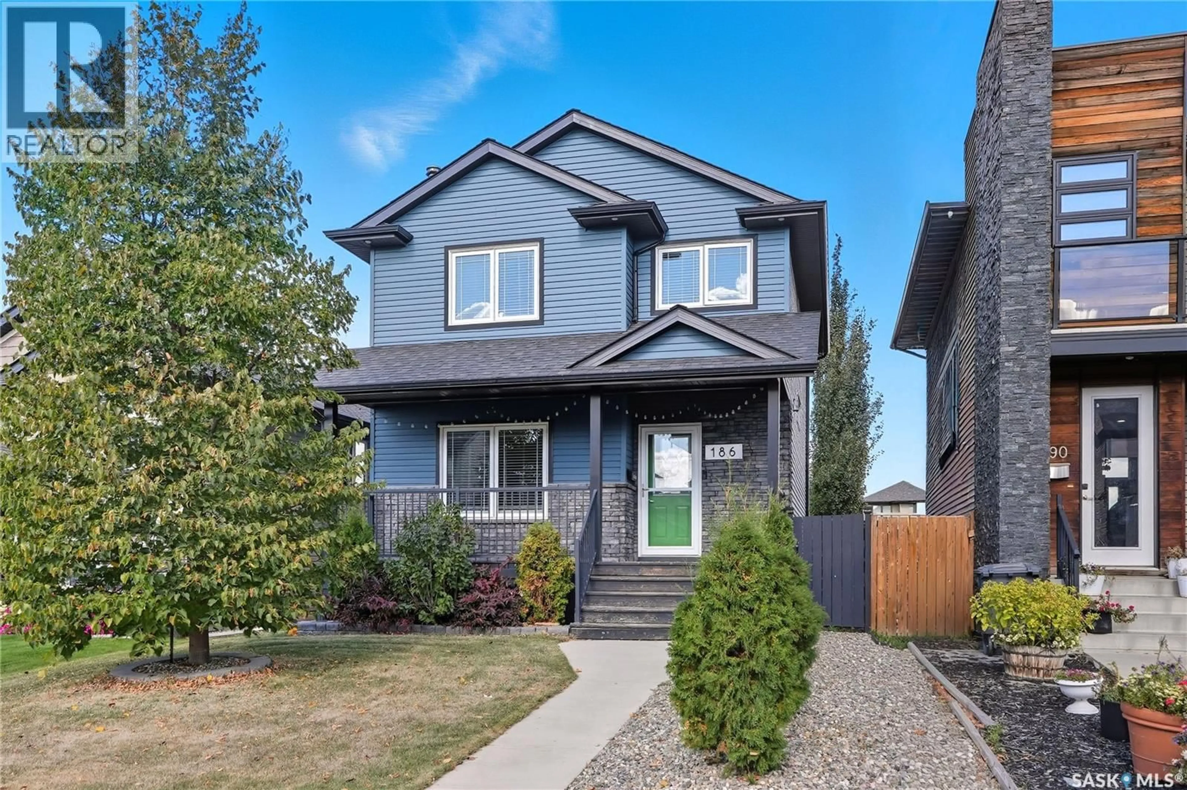Home with vinyl exterior material, street for 186 RAJPUT WAY, Saskatoon Saskatchewan S7W0L5