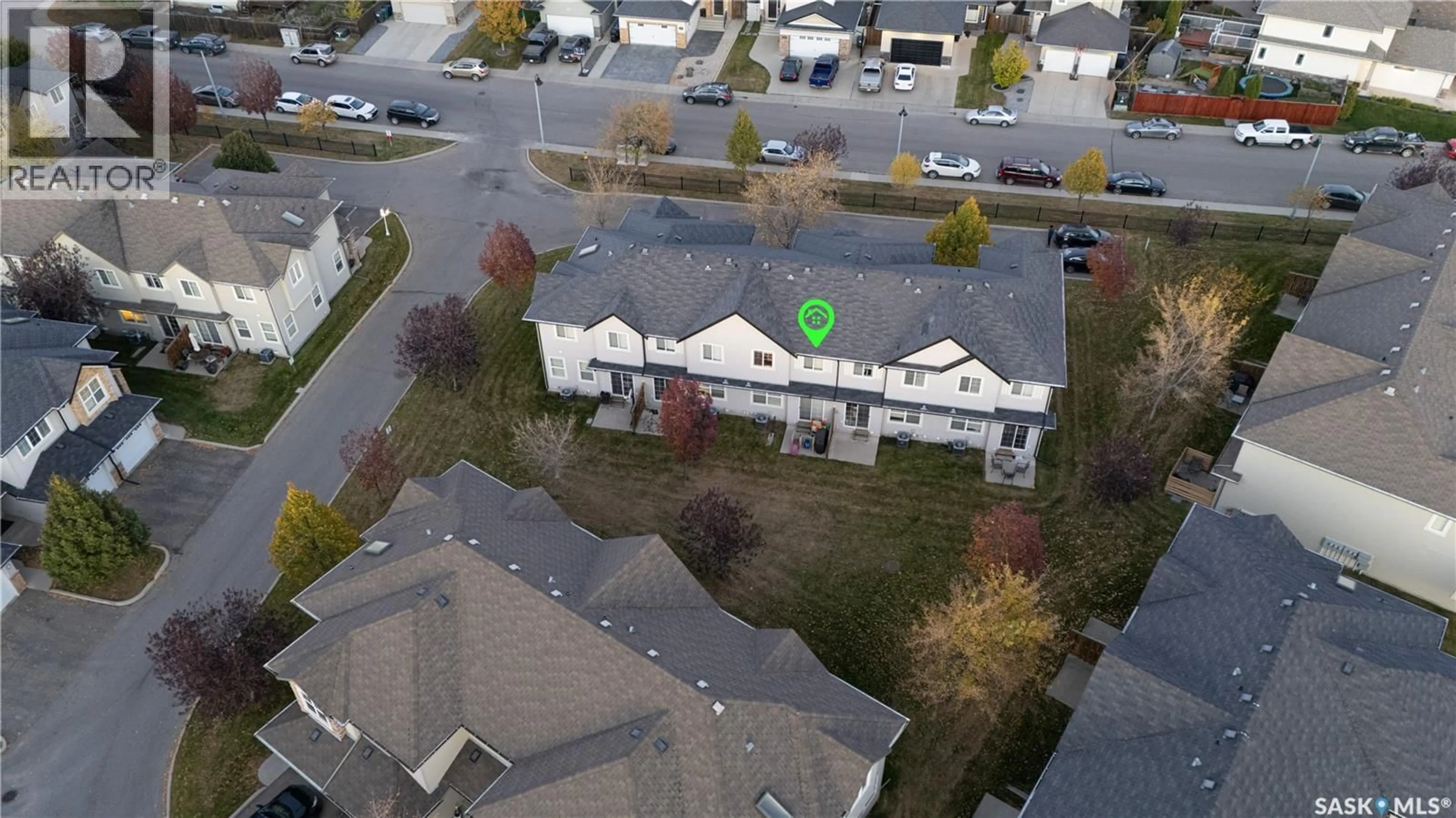 A pic from outside/outdoor area/front of a property/back of a property/a pic from drone, unknown for 615 - 403 LYND CRESCENT, Saskatoon Saskatchewan S7T0G8