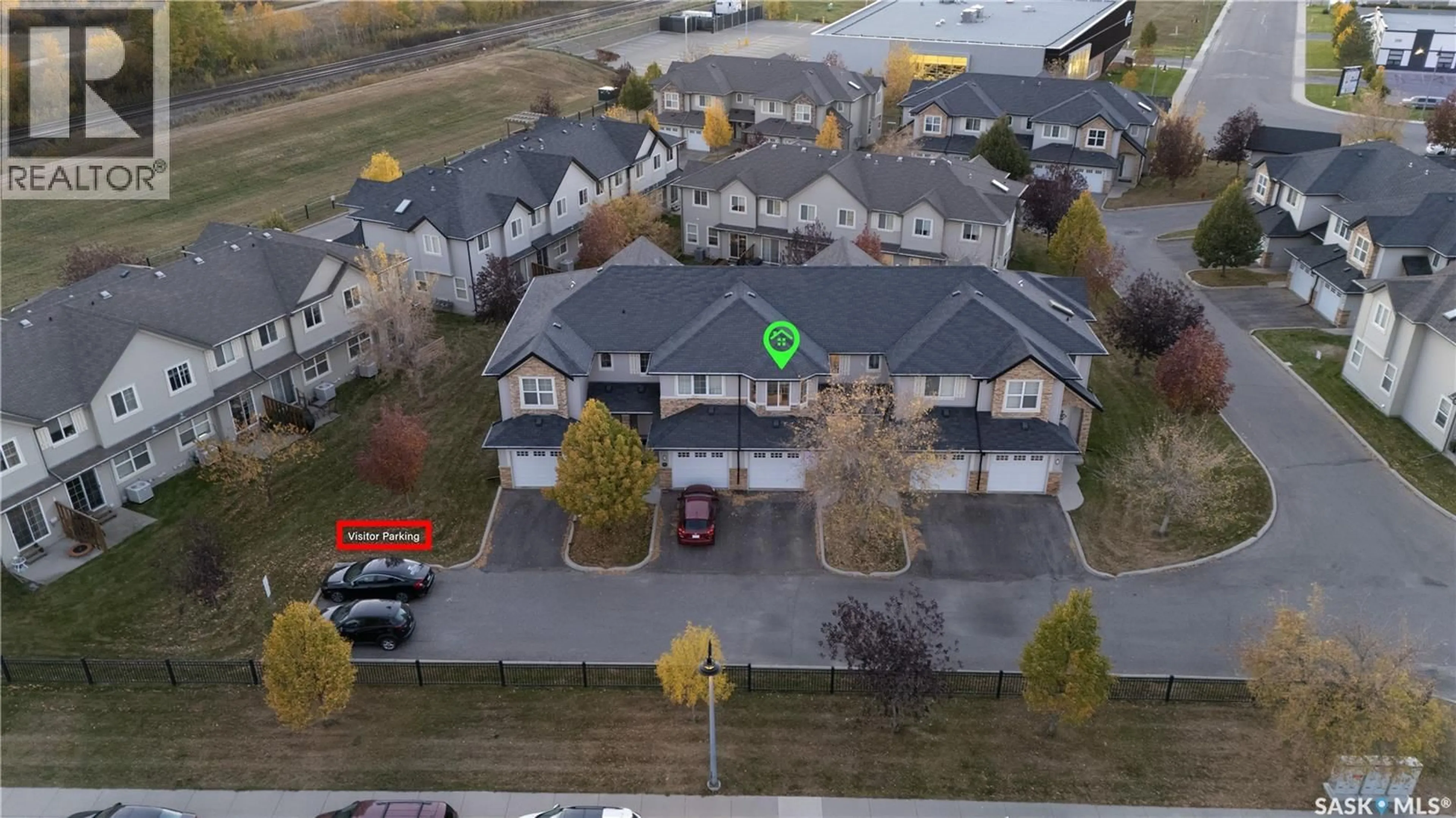 A pic from outside/outdoor area/front of a property/back of a property/a pic from drone, street for 615 - 403 LYND CRESCENT, Saskatoon Saskatchewan S7T0G8