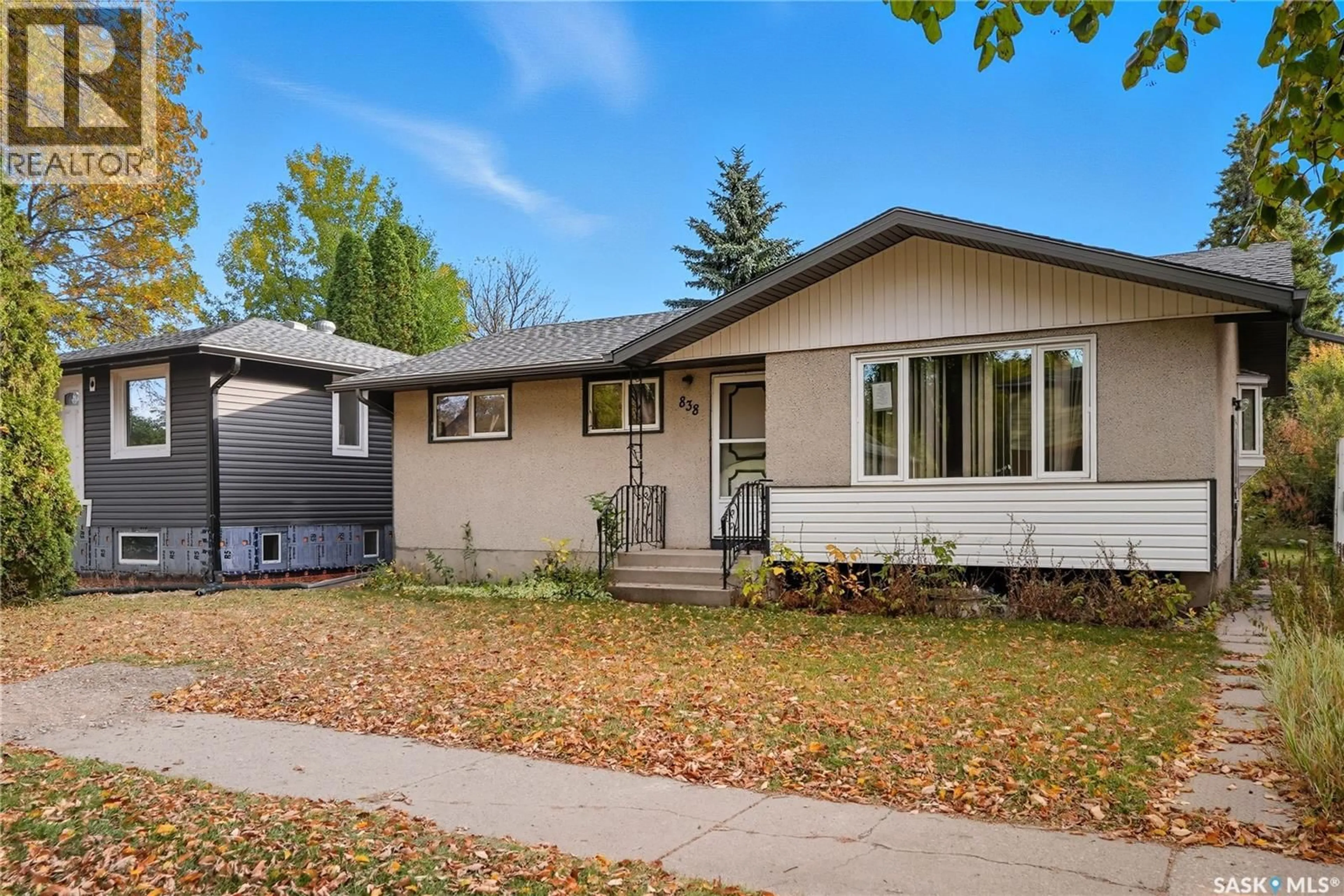 Home with vinyl exterior material, street for 838 6TH STREET, Saskatoon Saskatchewan S7H1C7