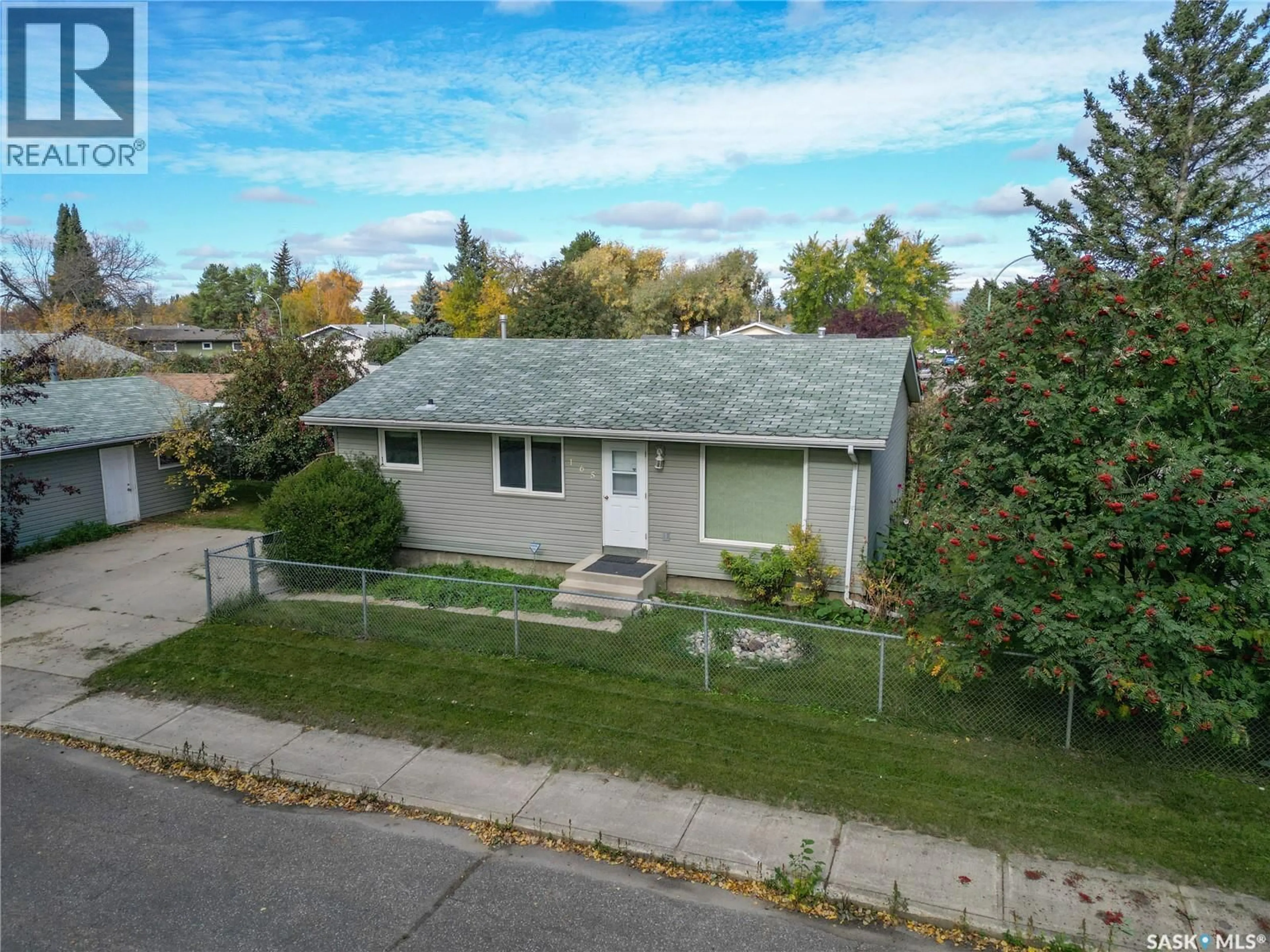 A pic from outside/outdoor area/front of a property/back of a property/a pic from drone, street for 165 MACDOWALL CRESCENT, Prince Albert Saskatchewan S6V6N4