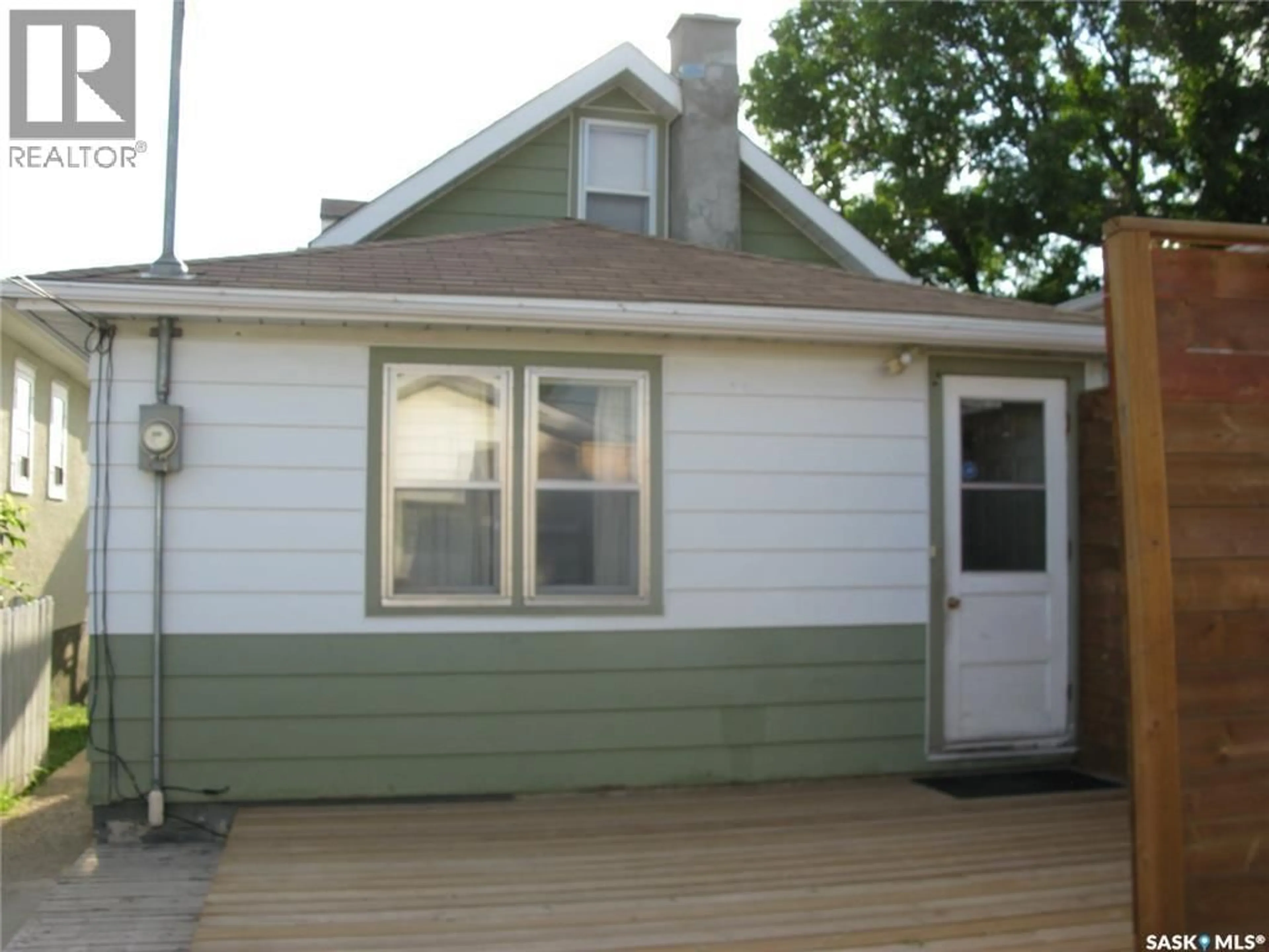 Home with vinyl exterior material, street for 2037 REYNOLDS STREET, Regina Saskatchewan S4N3M9