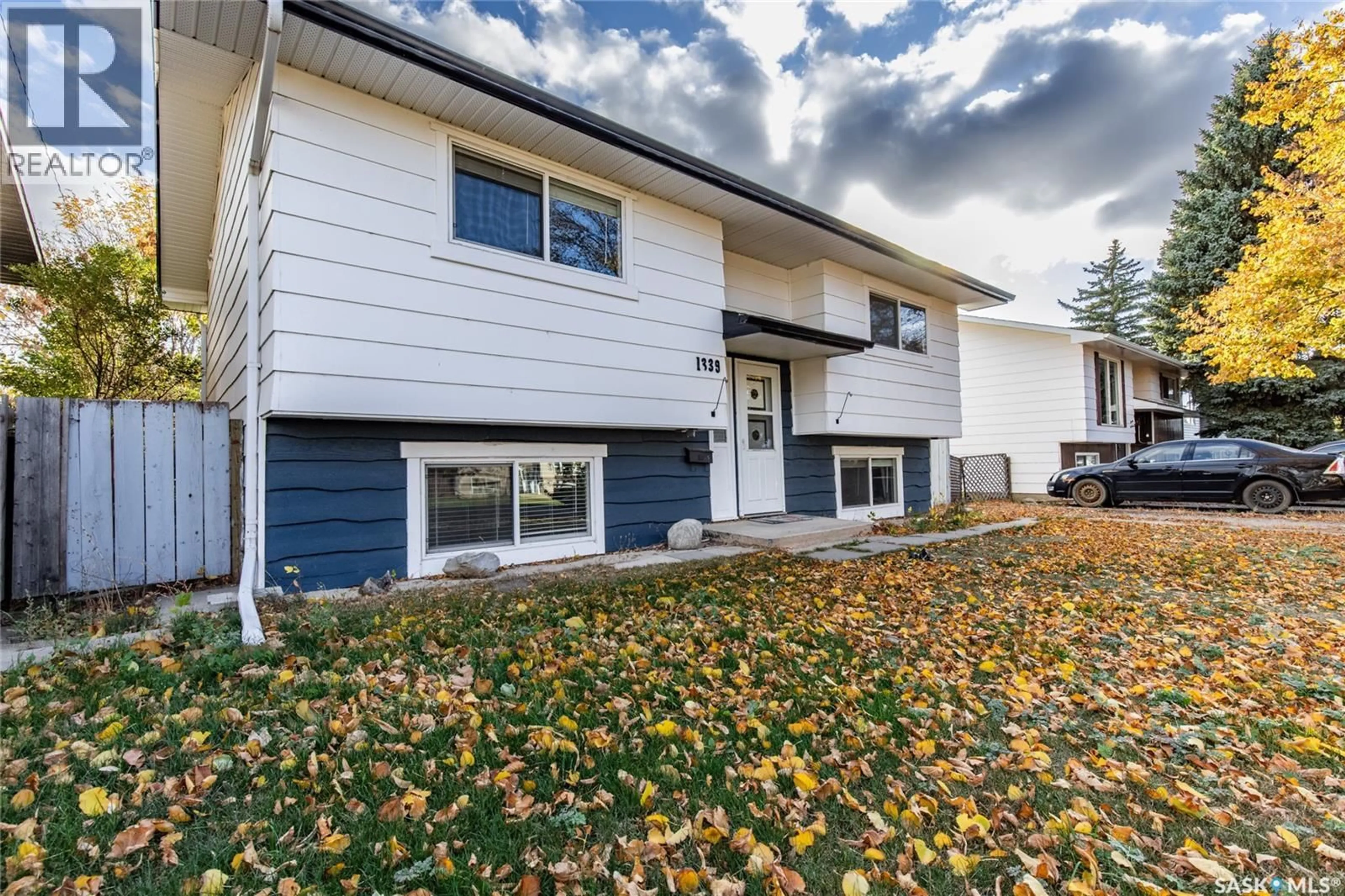 Home with vinyl exterior material, street for 1339 SPADINA STREET, Moose Jaw Saskatchewan S6H7G6