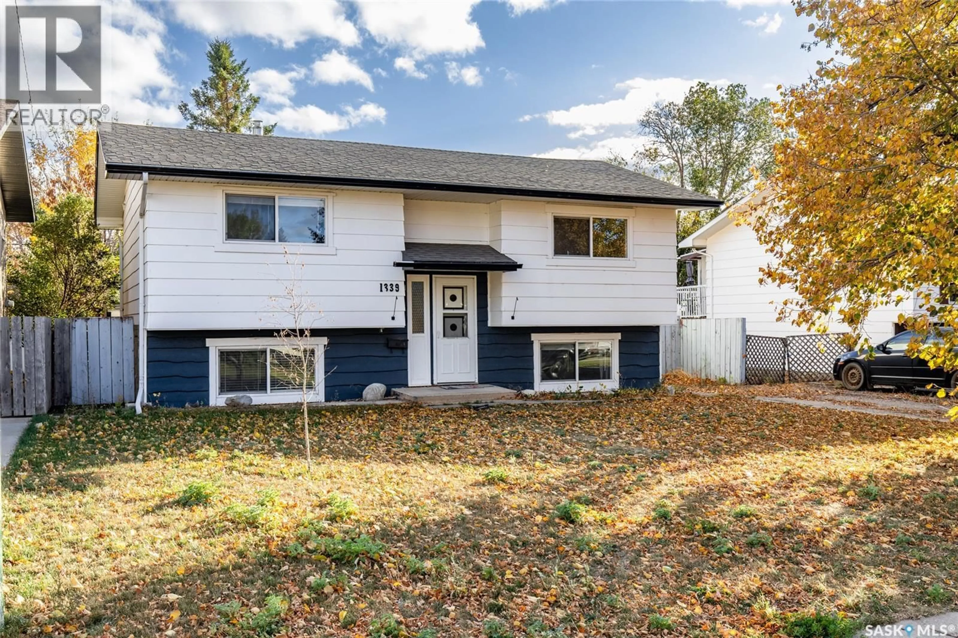 Home with vinyl exterior material, street for 1339 SPADINA STREET, Moose Jaw Saskatchewan S6H7G6