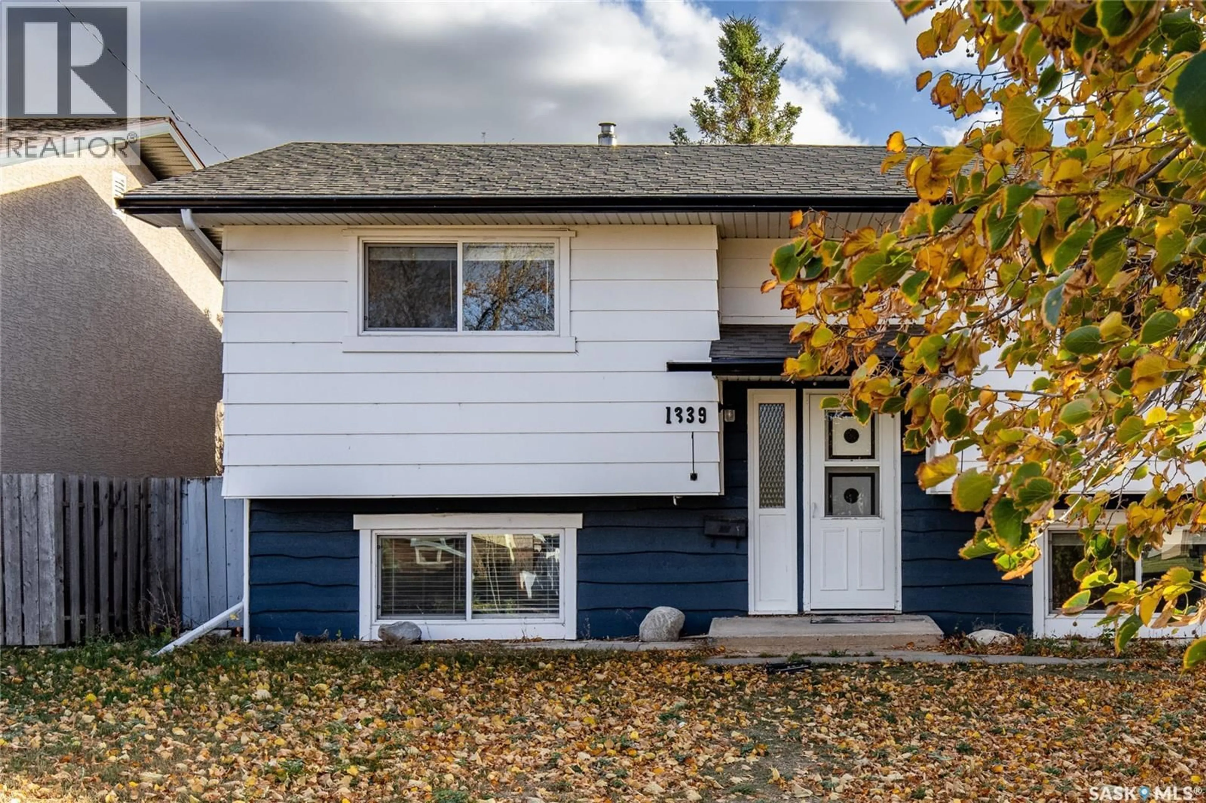 Home with vinyl exterior material, street for 1339 SPADINA STREET, Moose Jaw Saskatchewan S6H7G6