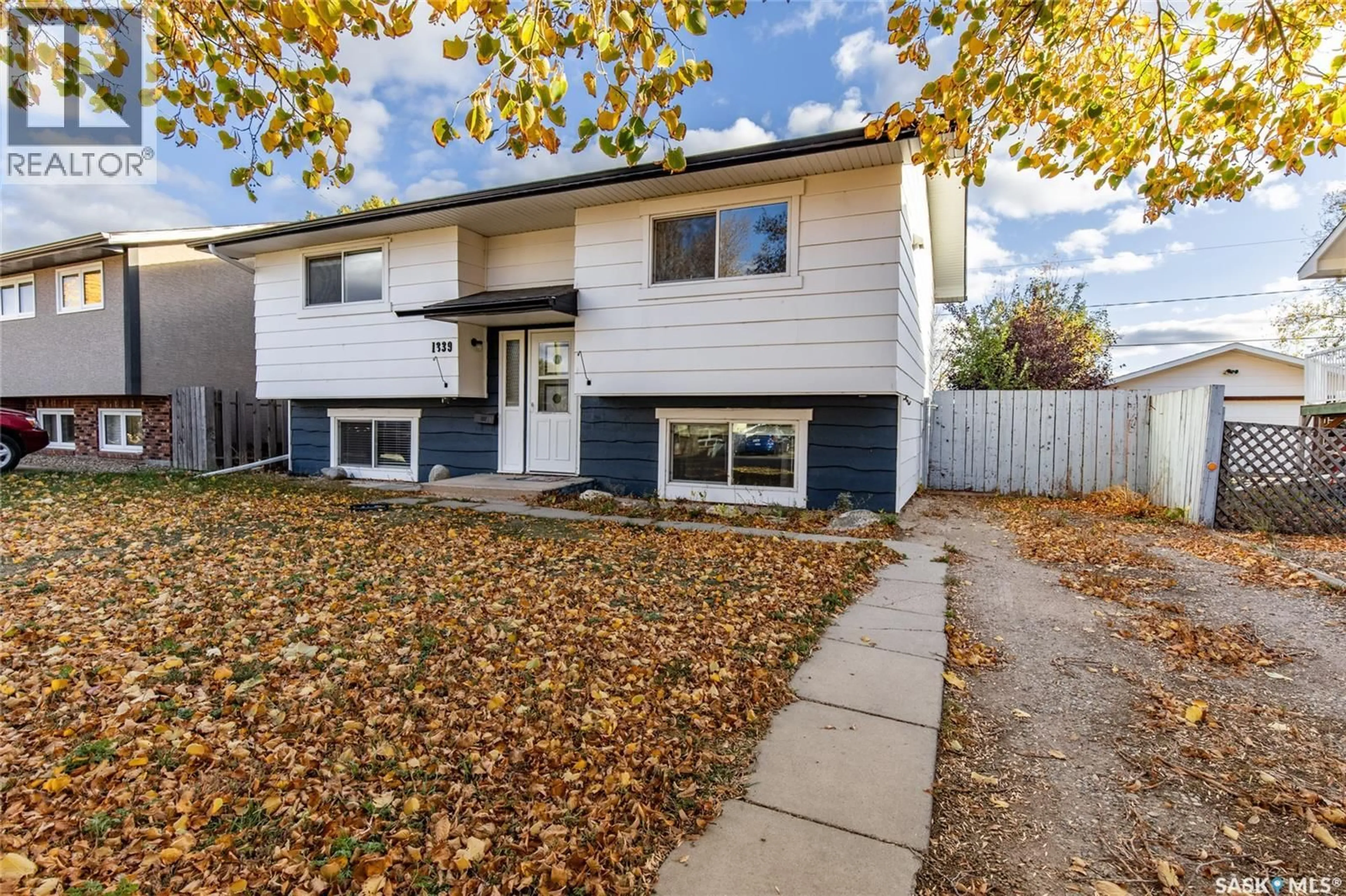 Home with vinyl exterior material, street for 1339 SPADINA STREET, Moose Jaw Saskatchewan S6H7G6