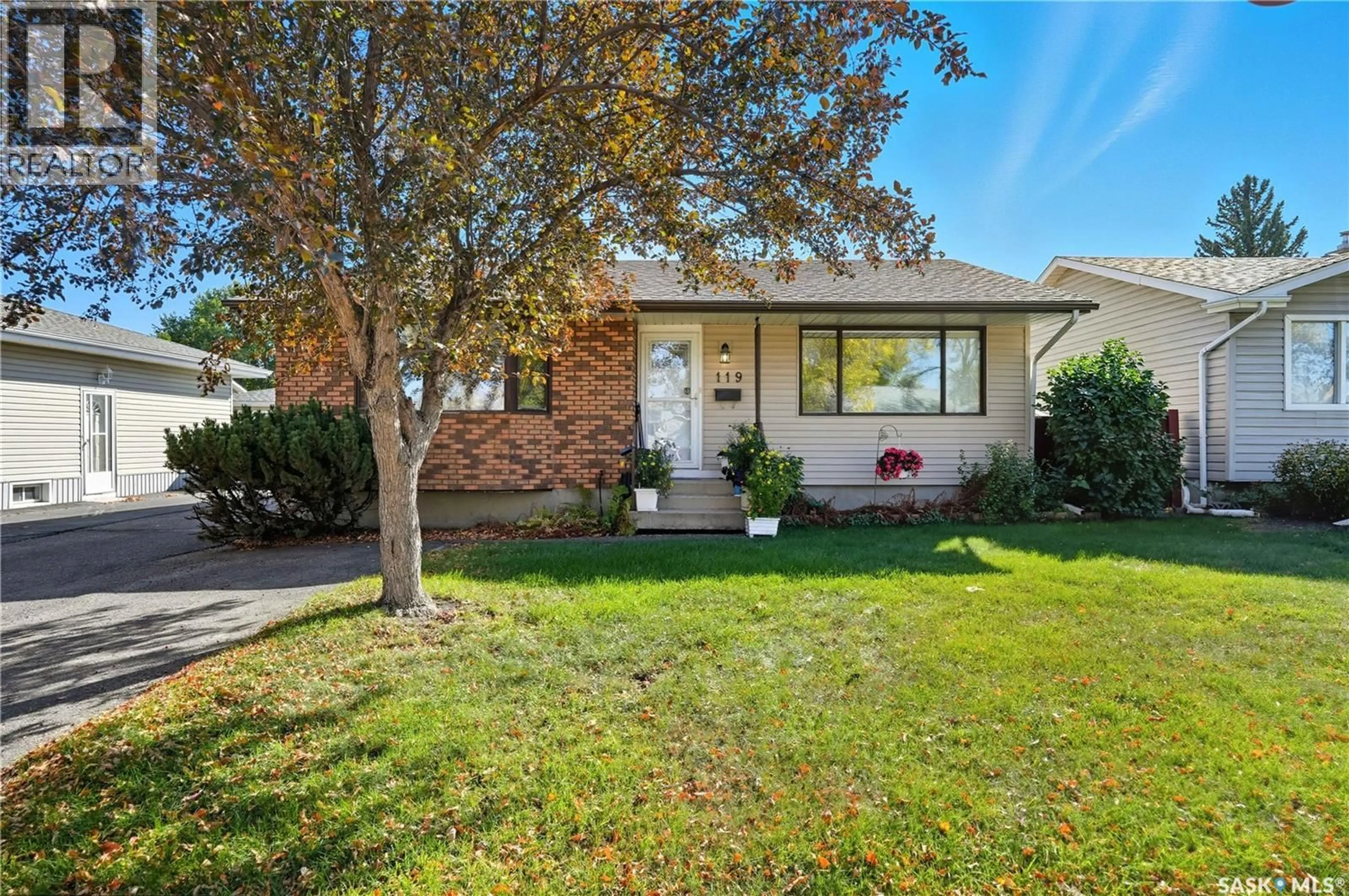Home with vinyl exterior material, street for 119 HAMMOND ROAD, Regina Saskatchewan S4R3C9
