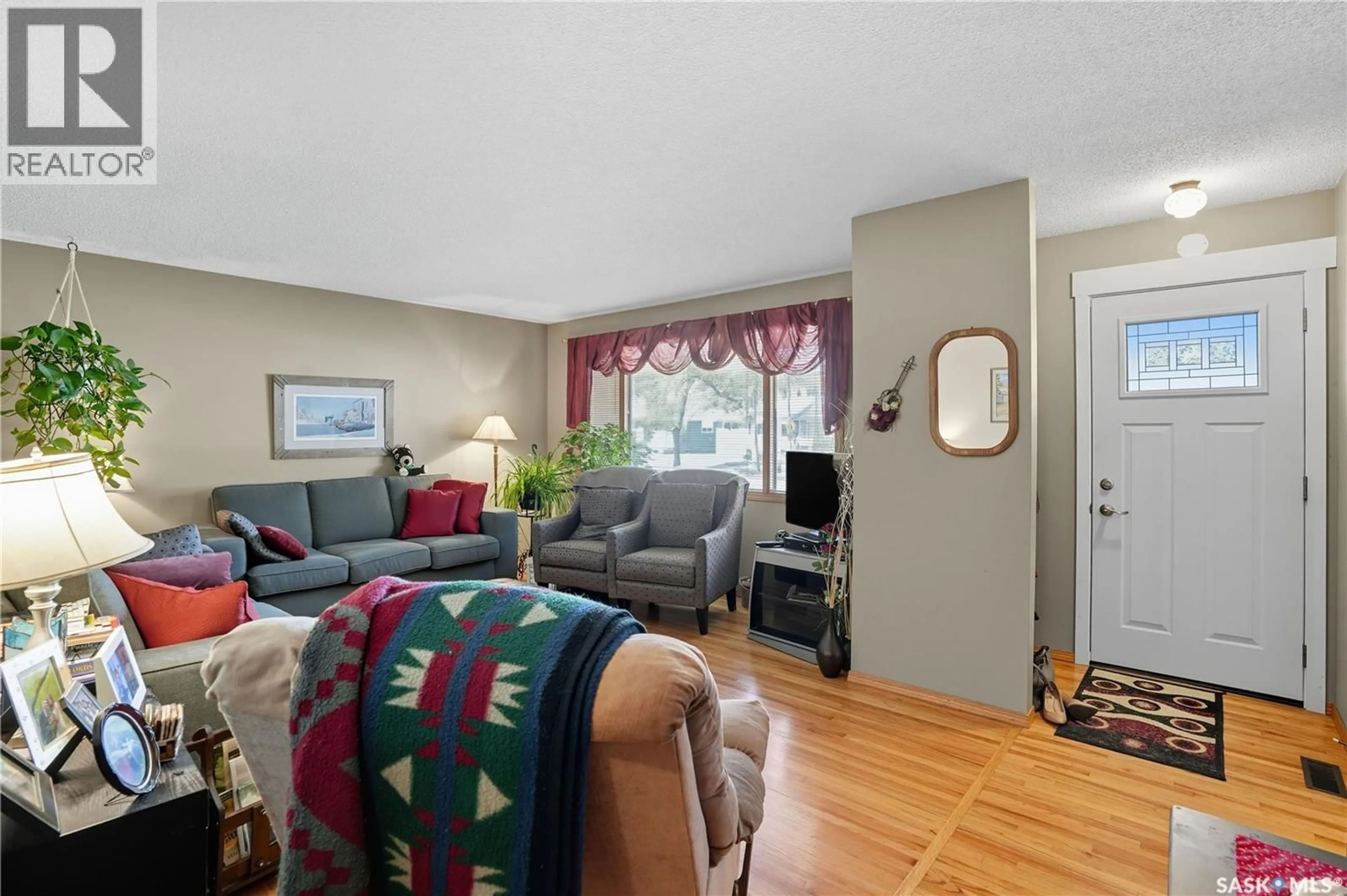 Living room with furniture, unknown for 119 HAMMOND ROAD, Regina Saskatchewan S4R3C9