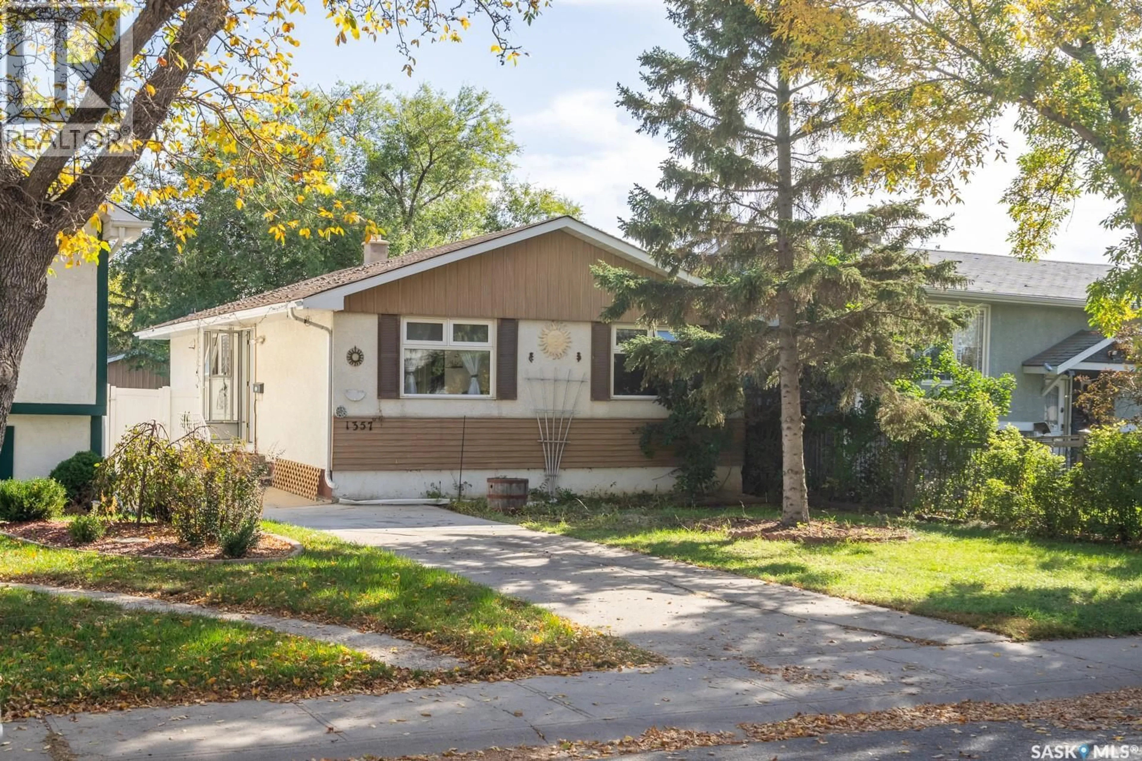 Home with vinyl exterior material, street for 1357 GROSVENOR STREET, Regina Saskatchewan S4N1R2