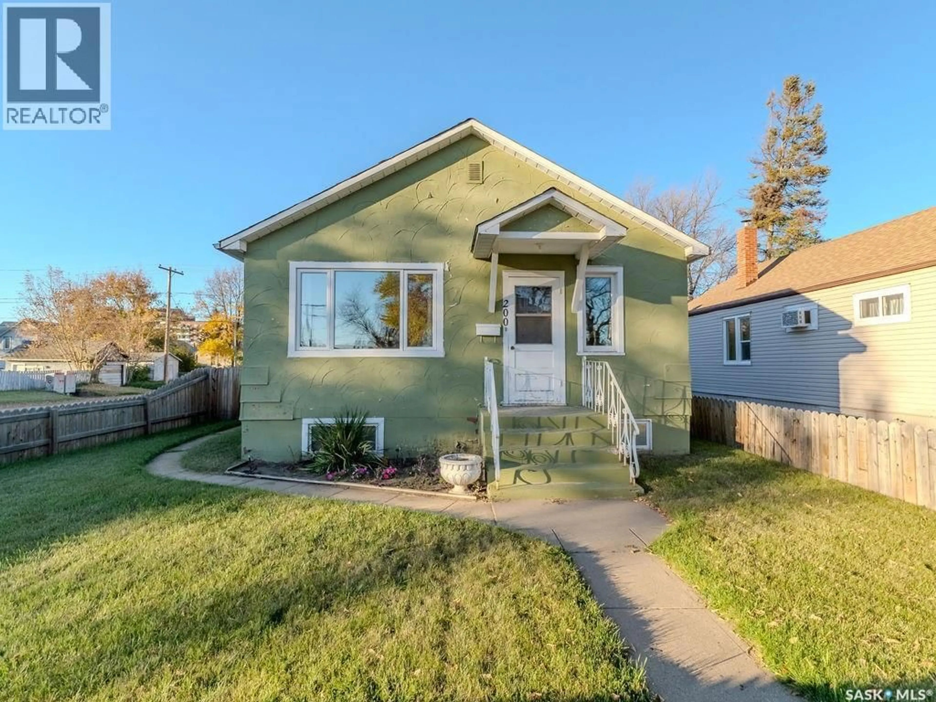 Home with vinyl exterior material, street for 200 11TH STREET, Prince Albert Saskatchewan S6V1A3