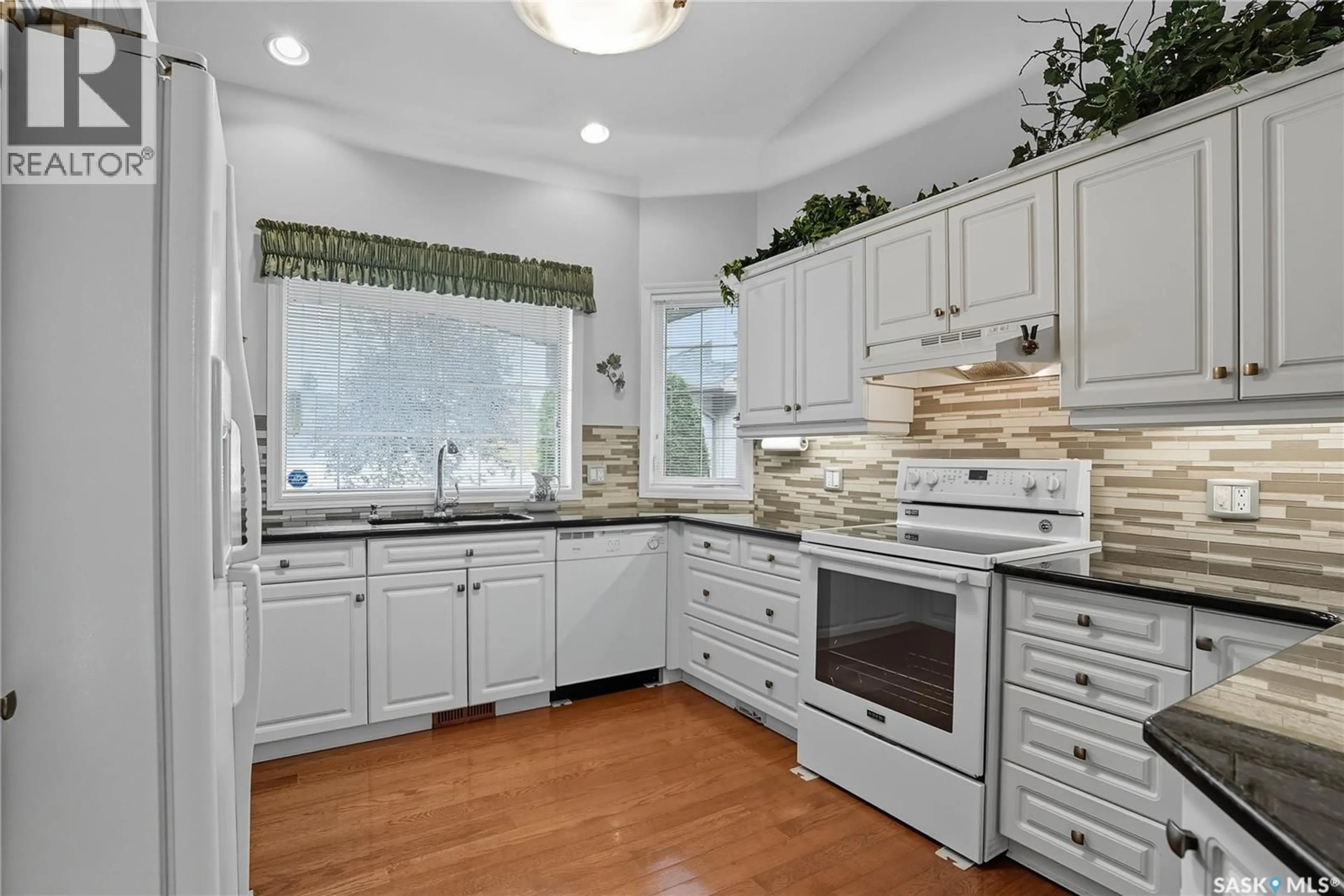 Open concept kitchen, ceramic/tile floor for 639 BUDZ CRESCENT, Saskatoon Saskatchewan S7N4N6
