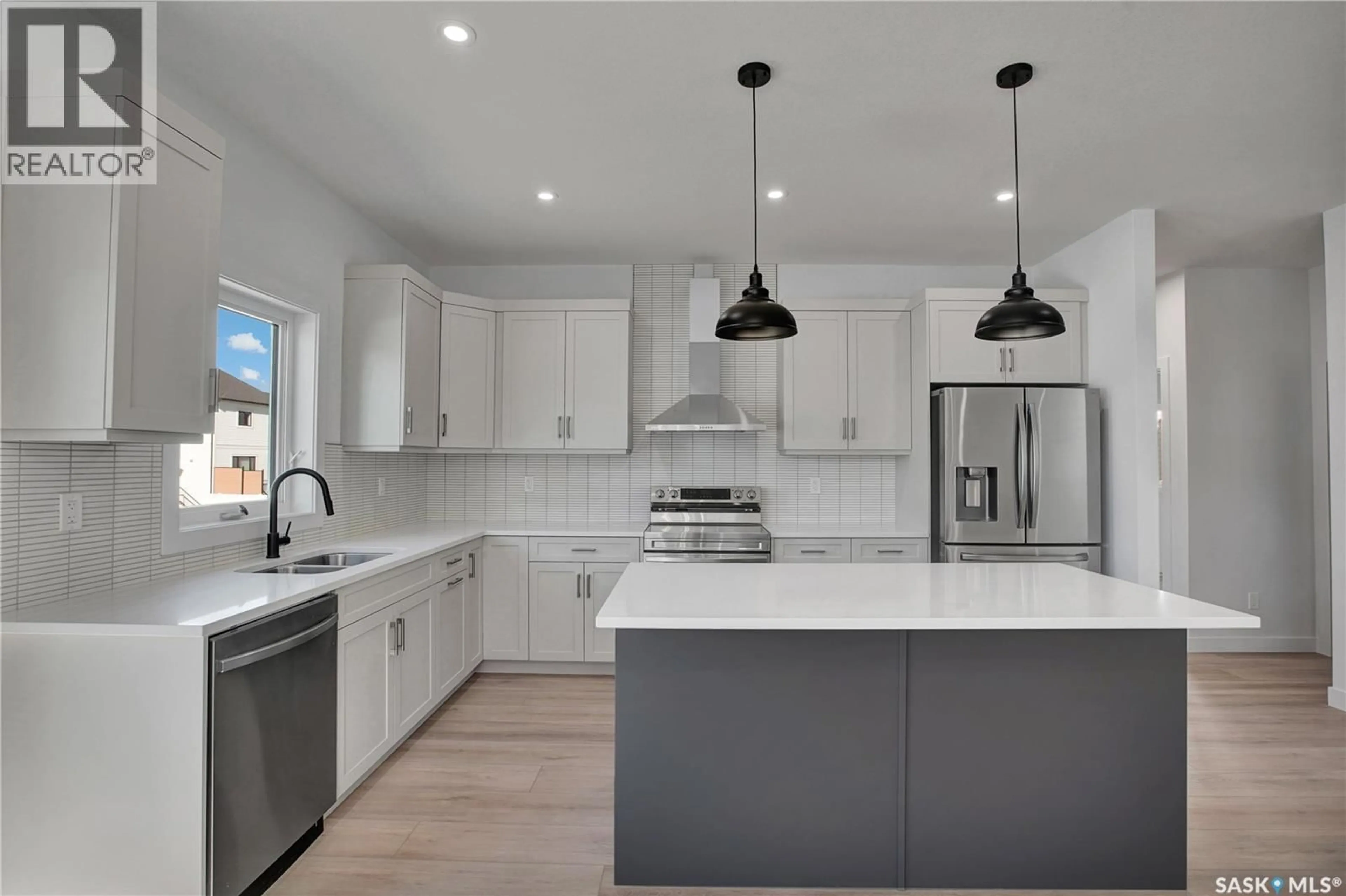 Open concept kitchen, ceramic/tile floor for 114 HAVERSTOCK CRESCENT, Saskatoon Saskatchewan S7W1E2