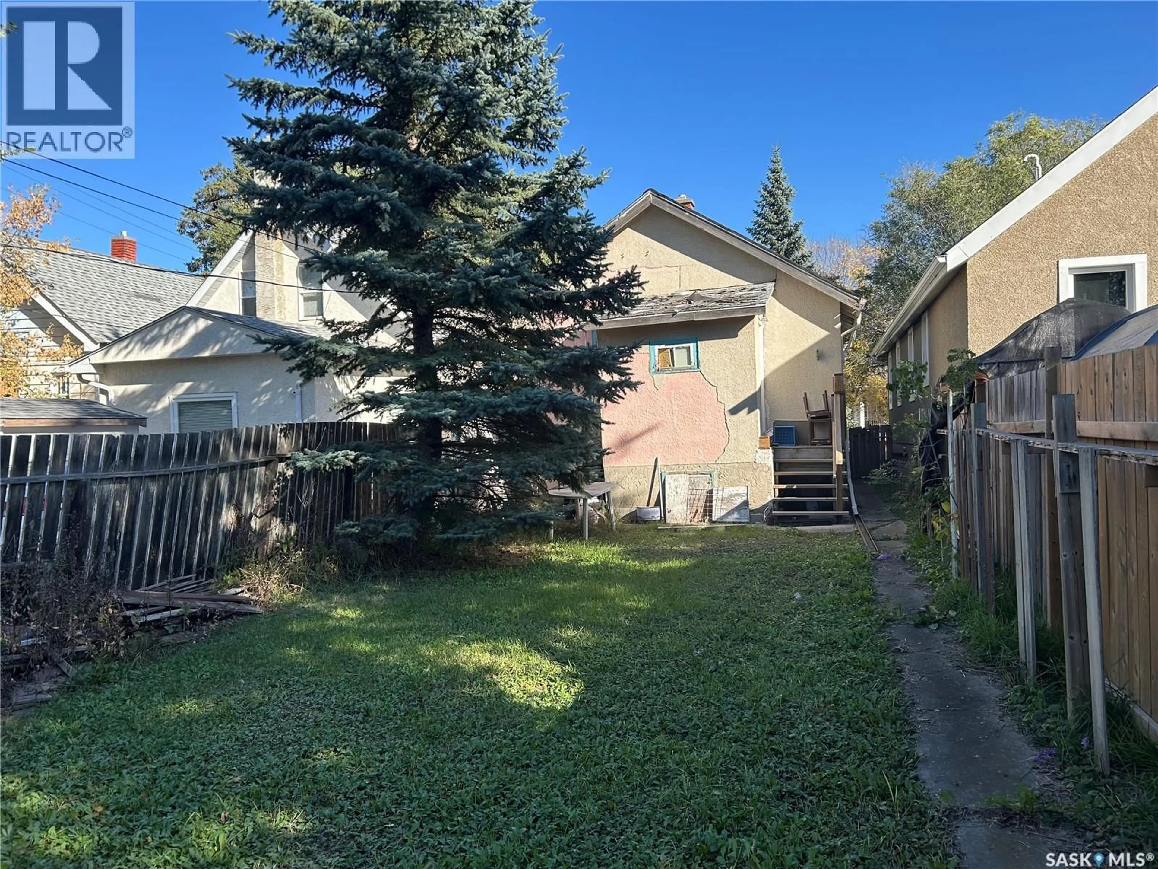 A pic from outside/outdoor area/front of a property/back of a property/a pic from drone, street for 2030 BRODER STREET, Regina Saskatchewan S4N3S2