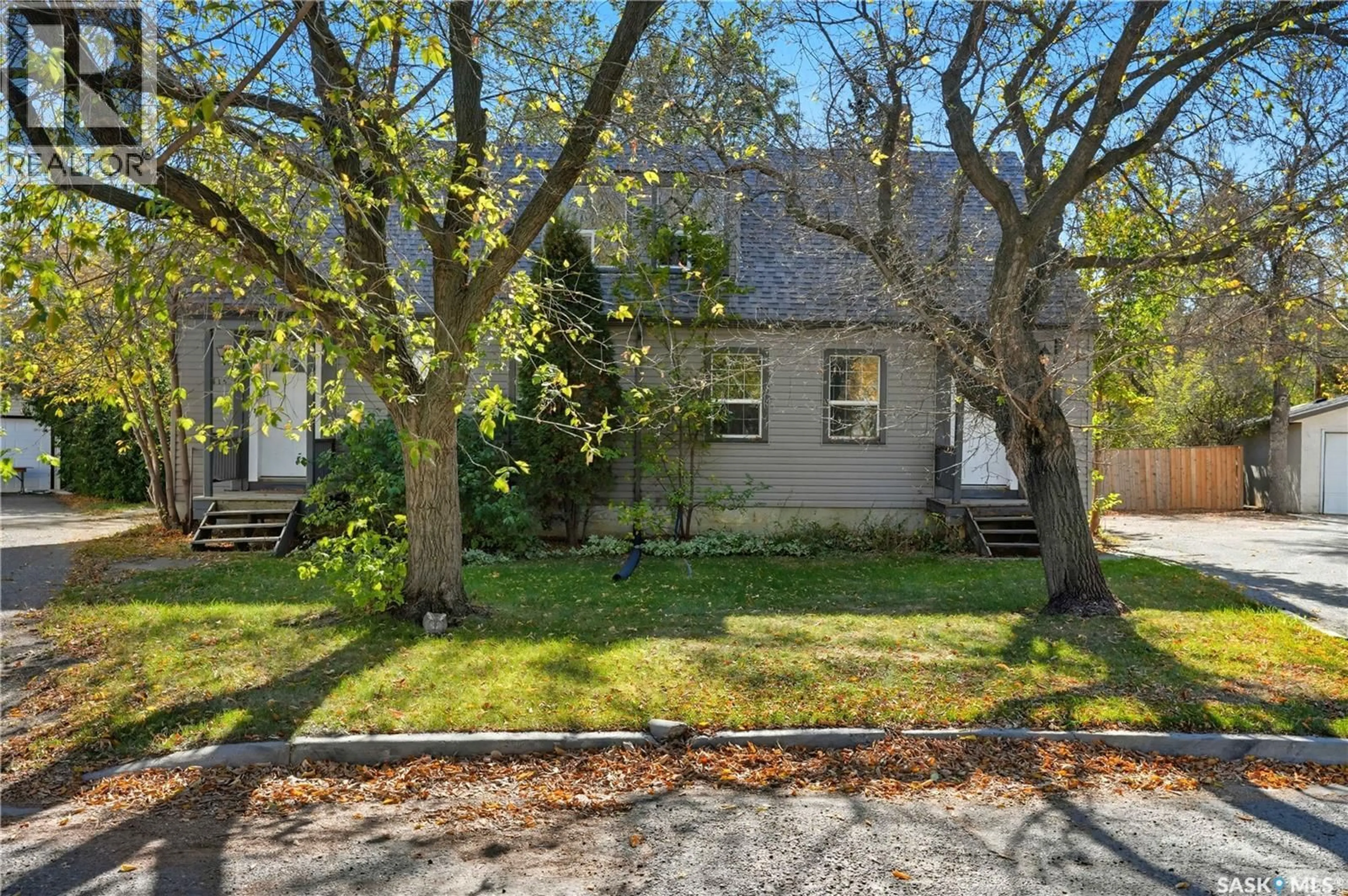 A pic from outside/outdoor area/front of a property/back of a property/a pic from drone, street for A&B - 2614 ELLIOTT DRIVE, Regina Saskatchewan S4N3H7