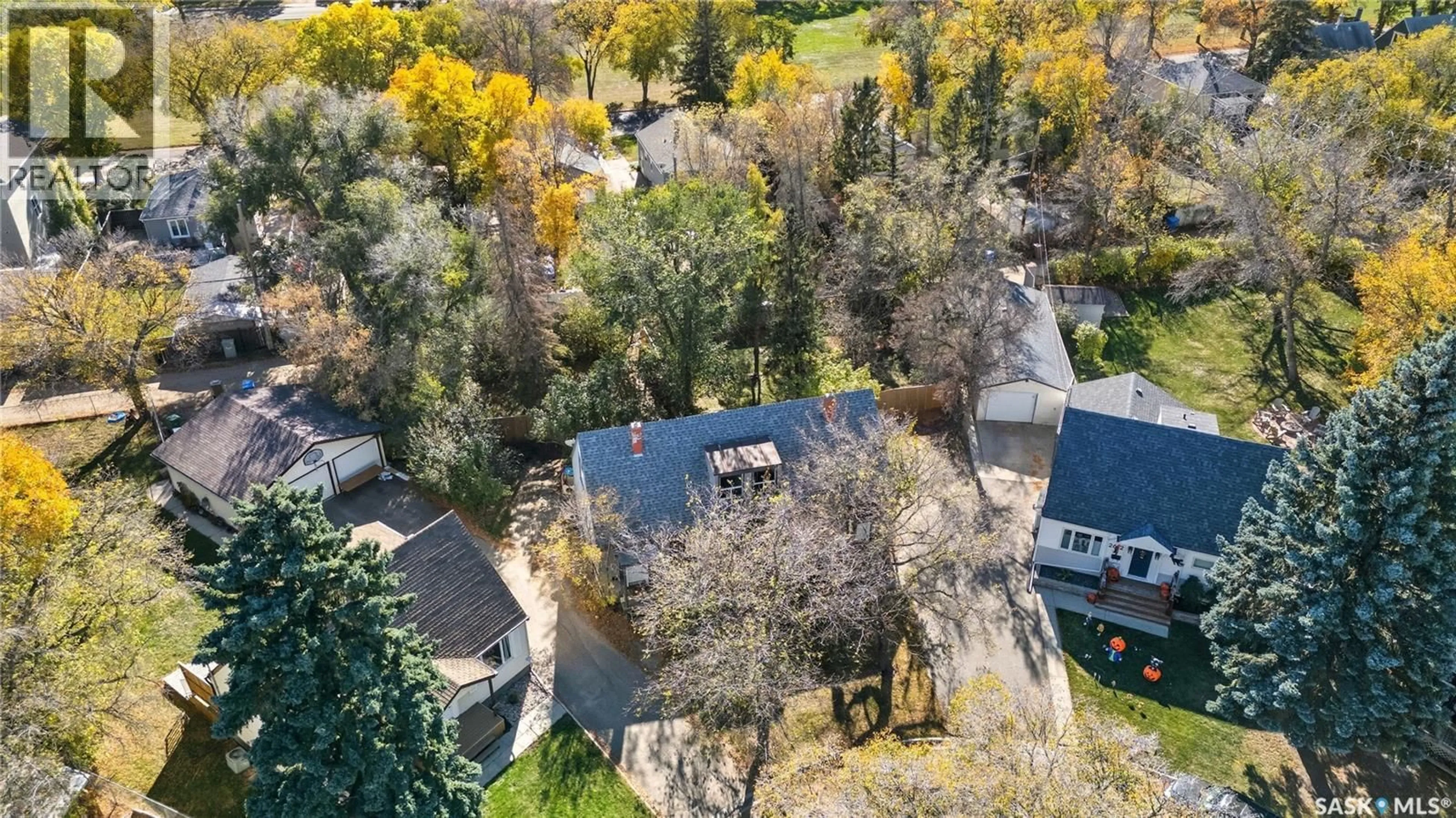 A pic from outside/outdoor area/front of a property/back of a property/a pic from drone, street for A&B - 2614 ELLIOTT DRIVE, Regina Saskatchewan S4N3H7
