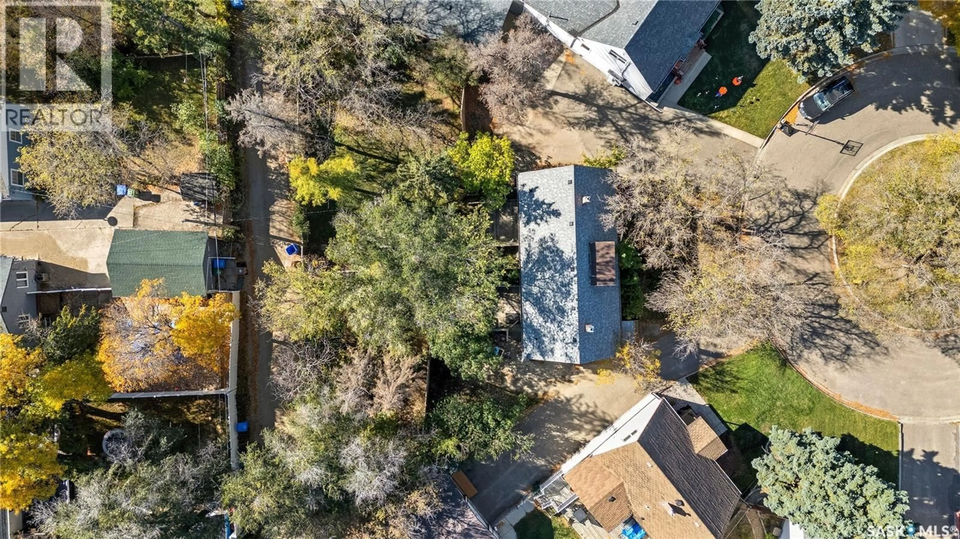 A pic from outside/outdoor area/front of a property/back of a property/a pic from drone, street for A&B - 2614 ELLIOTT DRIVE, Regina Saskatchewan S4N3H7