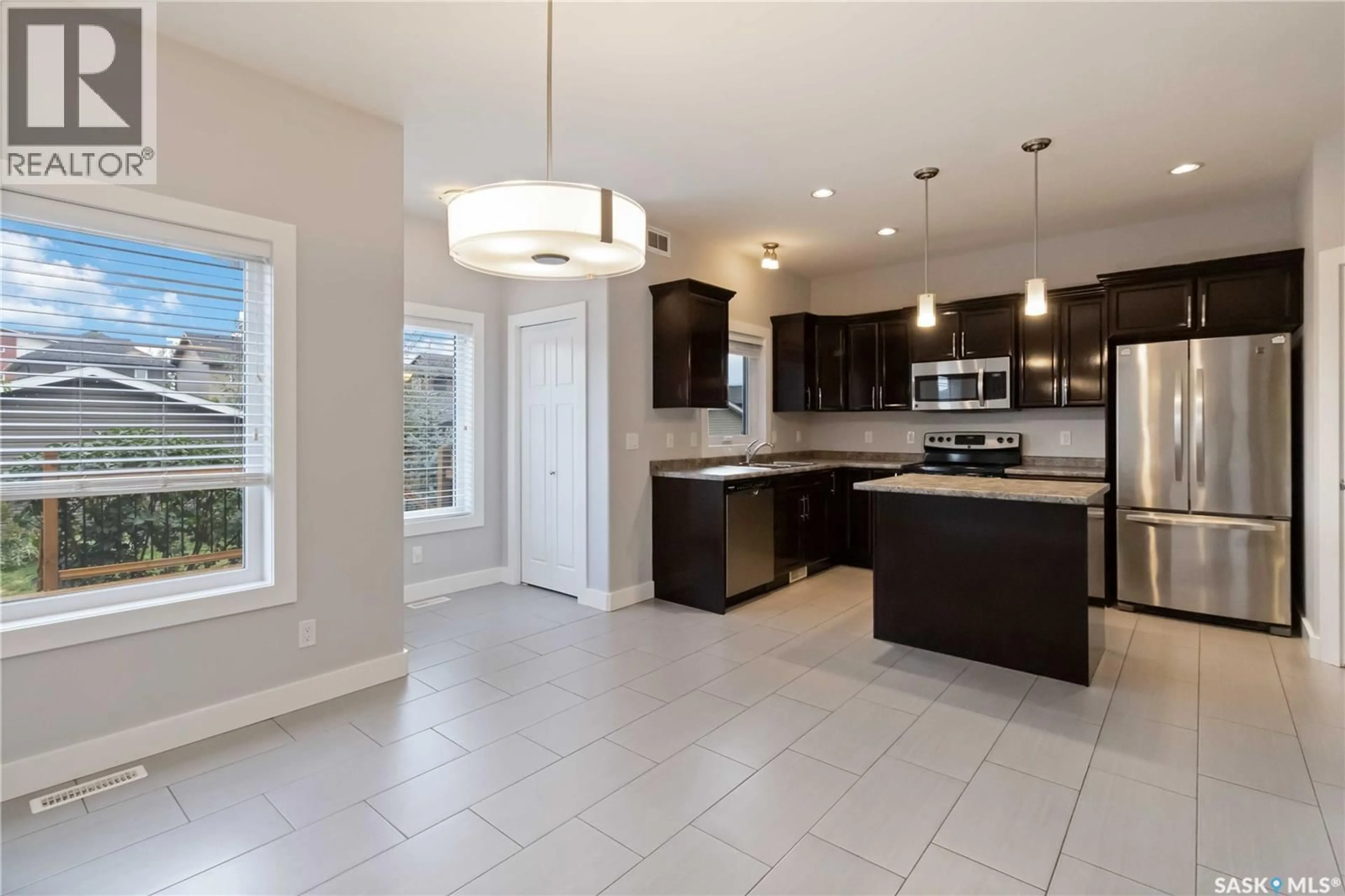 Open concept kitchen, ceramic/tile floor for 426 VELTKAMP CRESCENT, Saskatoon Saskatchewan S7T0S2