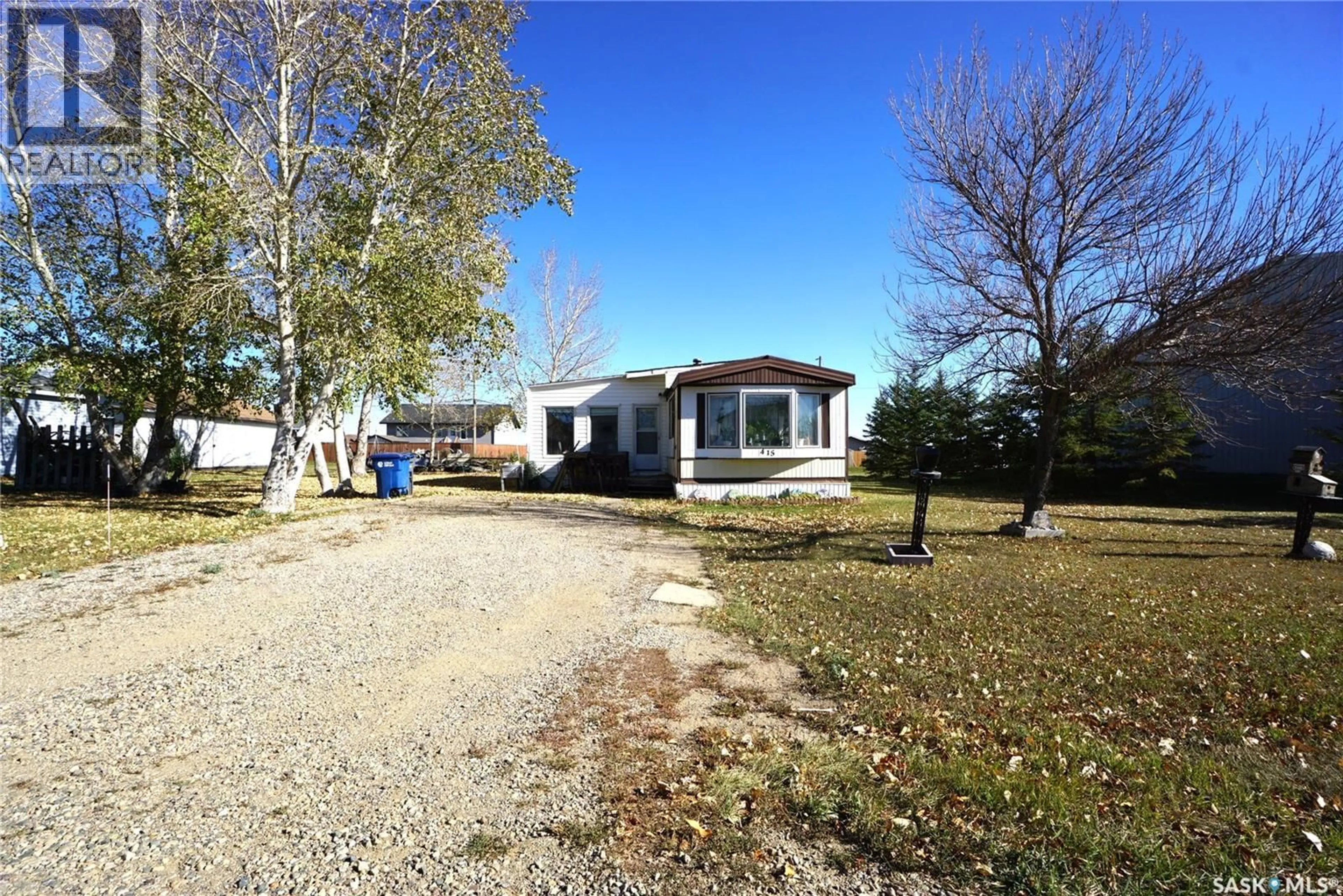 A pic from outside/outdoor area/front of a property/back of a property/a pic from drone, street for 415 BRUNSWICK STREET, Pense Saskatchewan S0G3W0