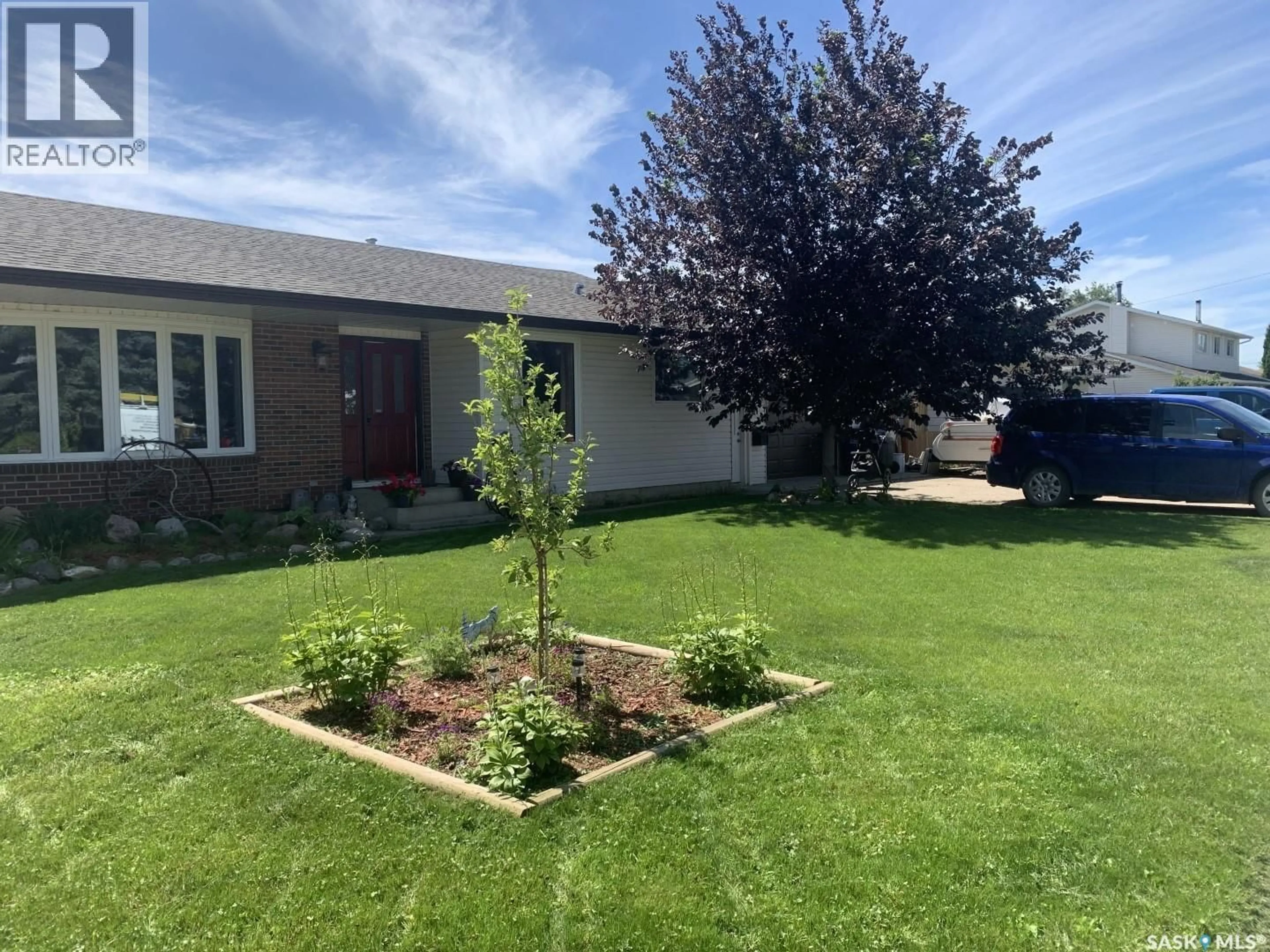 A pic from outside/outdoor area/front of a property/back of a property/a pic from drone, street for 410 3RD STREET, Langham Saskatchewan S0K2L0
