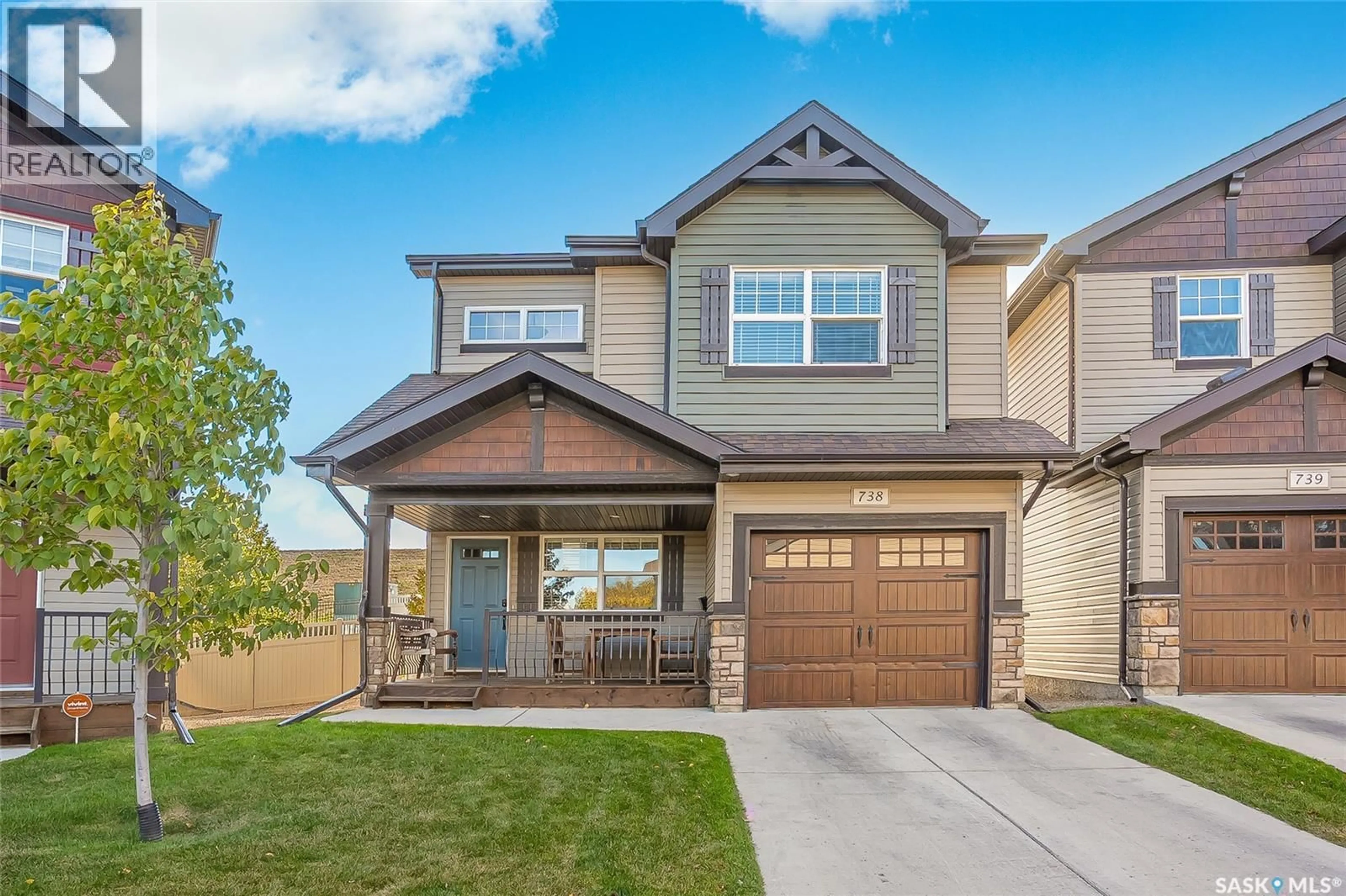 Home with vinyl exterior material, street for 738 150 LANGLOIS WAY, Saskatoon Saskatchewan S7T0L4