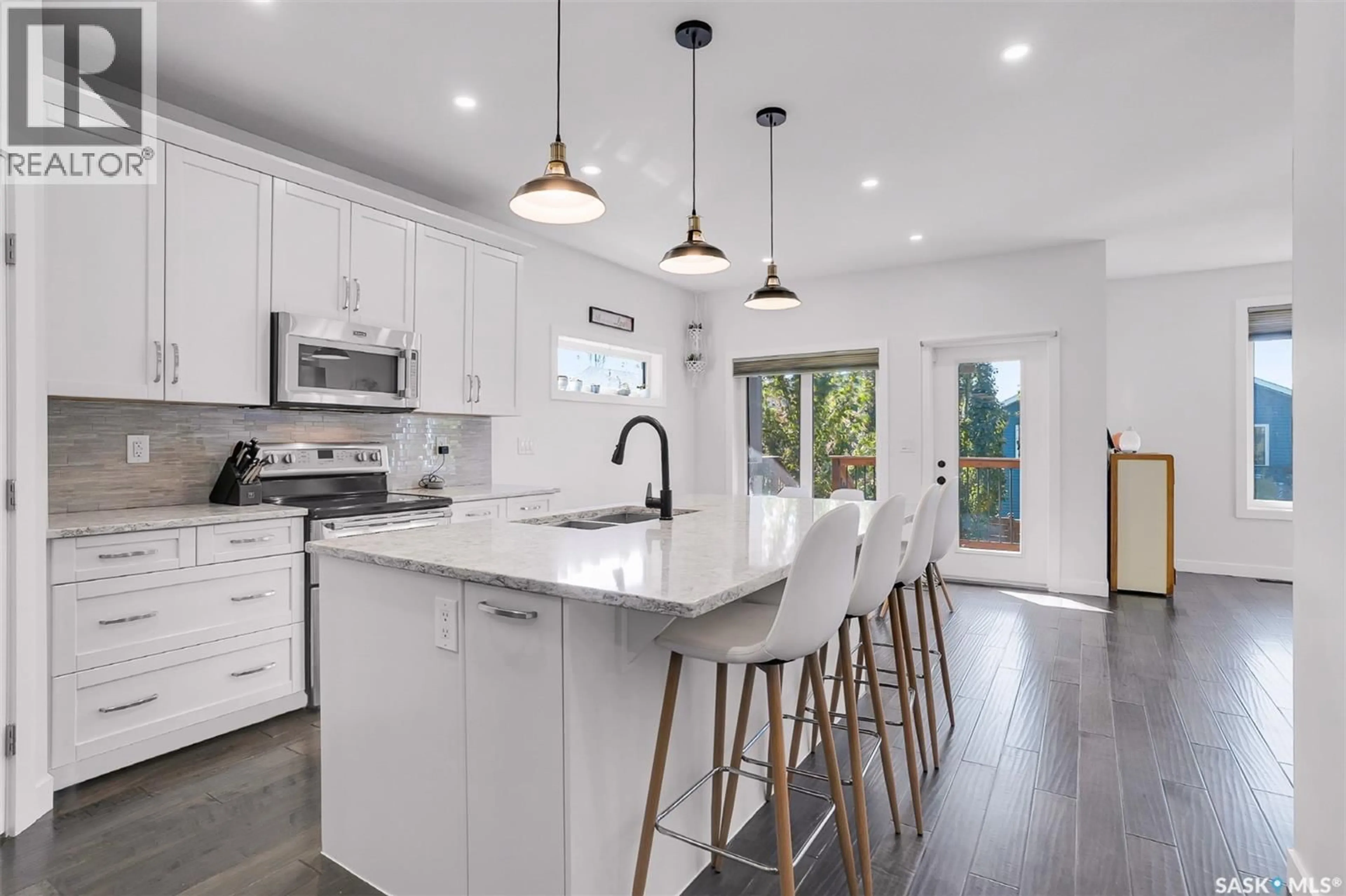 Open concept kitchen, ceramic/tile floor for 1042 GLACIAL SHORES COMMON, Saskatoon Saskatchewan S7W0R3