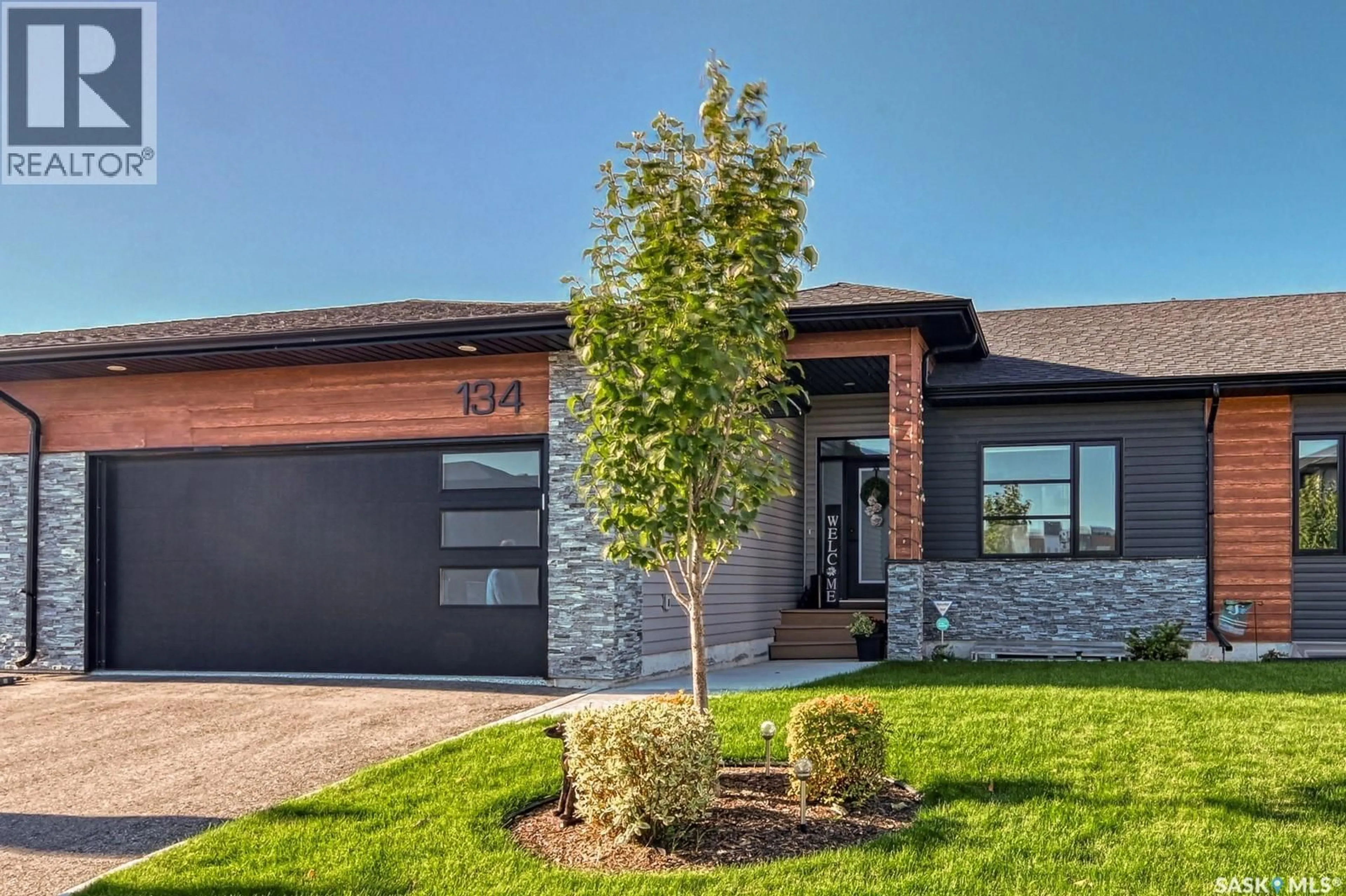 Home with brick exterior material, street for 134 3960 GREEN FALLS DRIVE, Regina Saskatchewan S4V3T5