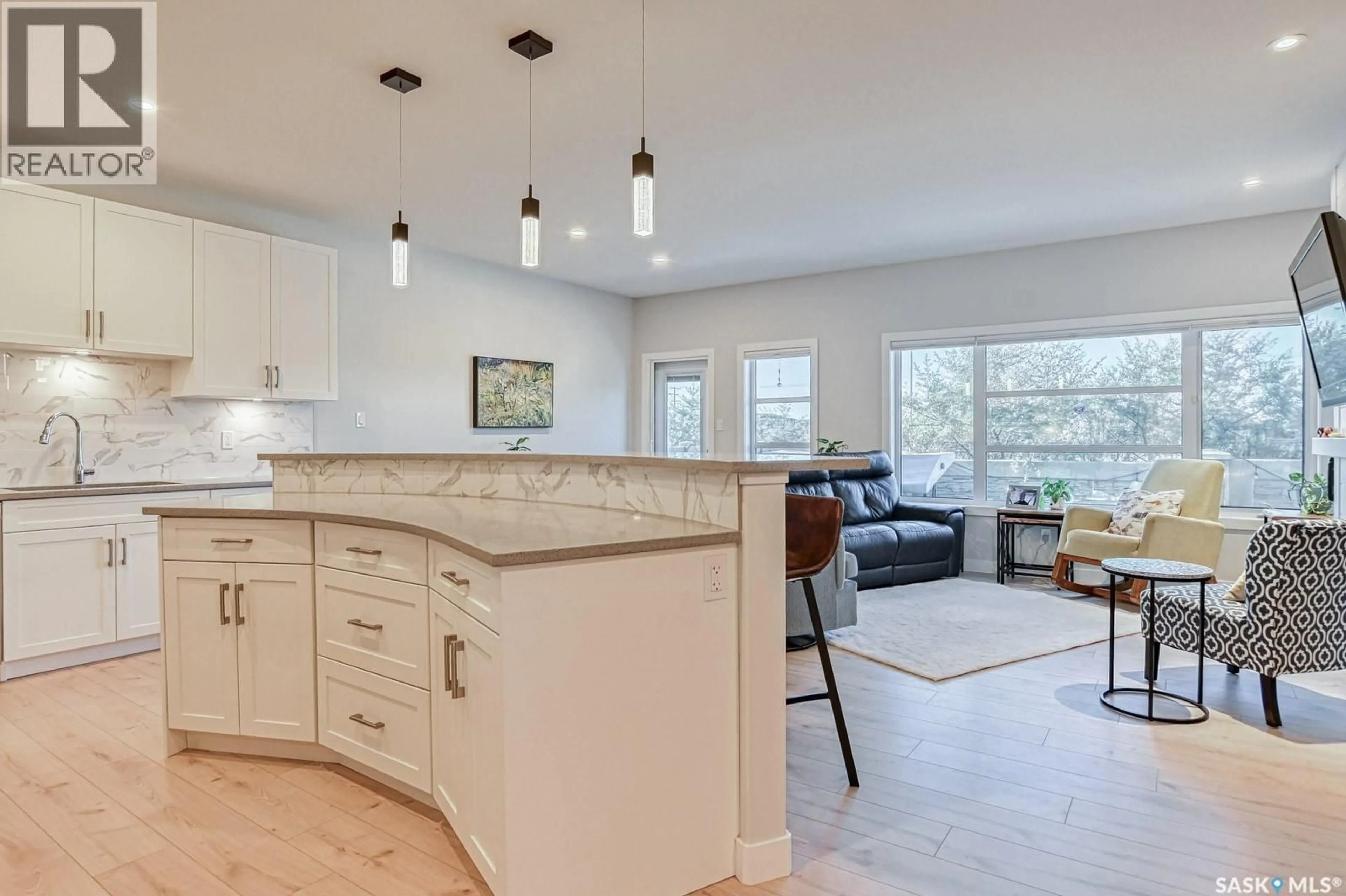 Open concept kitchen, ceramic/tile floor for 134 3960 GREEN FALLS DRIVE, Regina Saskatchewan S4V3T5