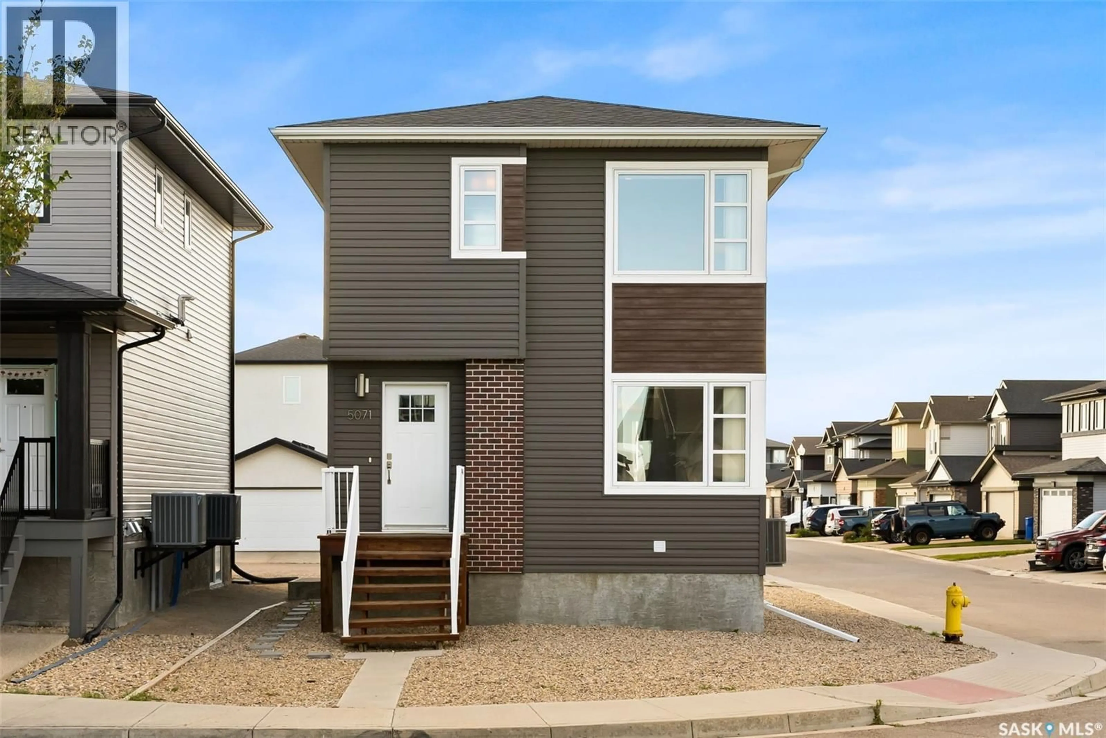 Home with vinyl exterior material, street for 5071 CRANE CRESCENT, Regina Saskatchewan S4W0H9