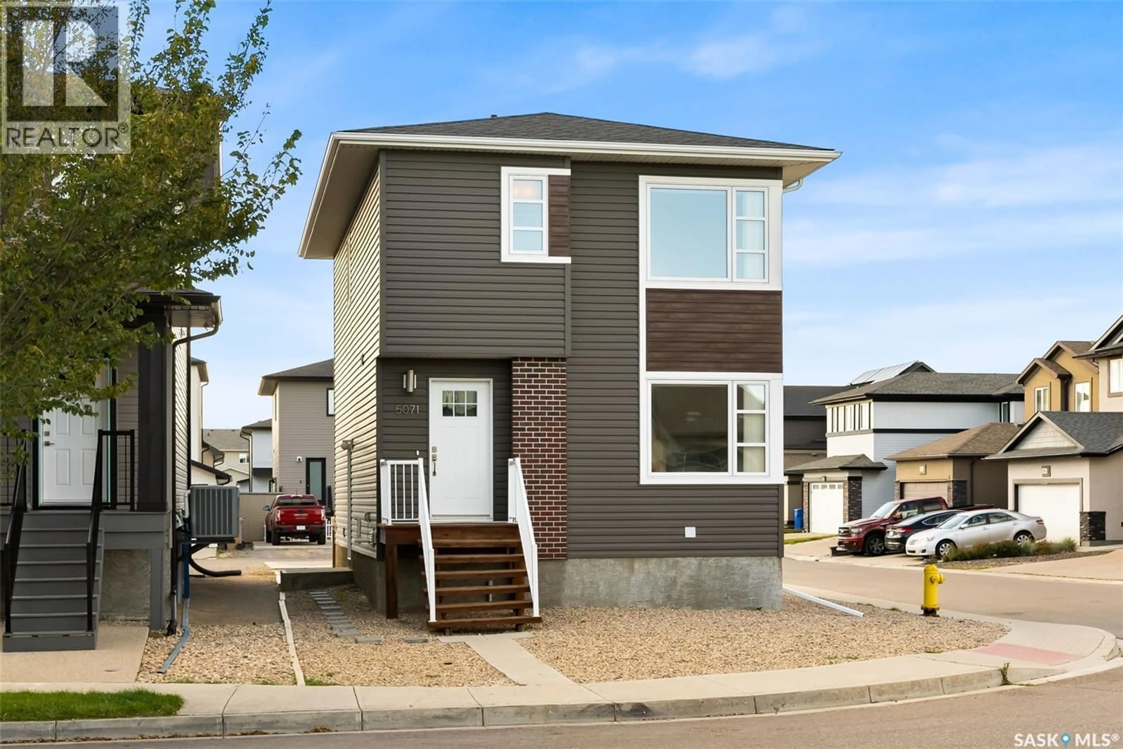 Home with vinyl exterior material, street for 5071 CRANE CRESCENT, Regina Saskatchewan S4W0H9