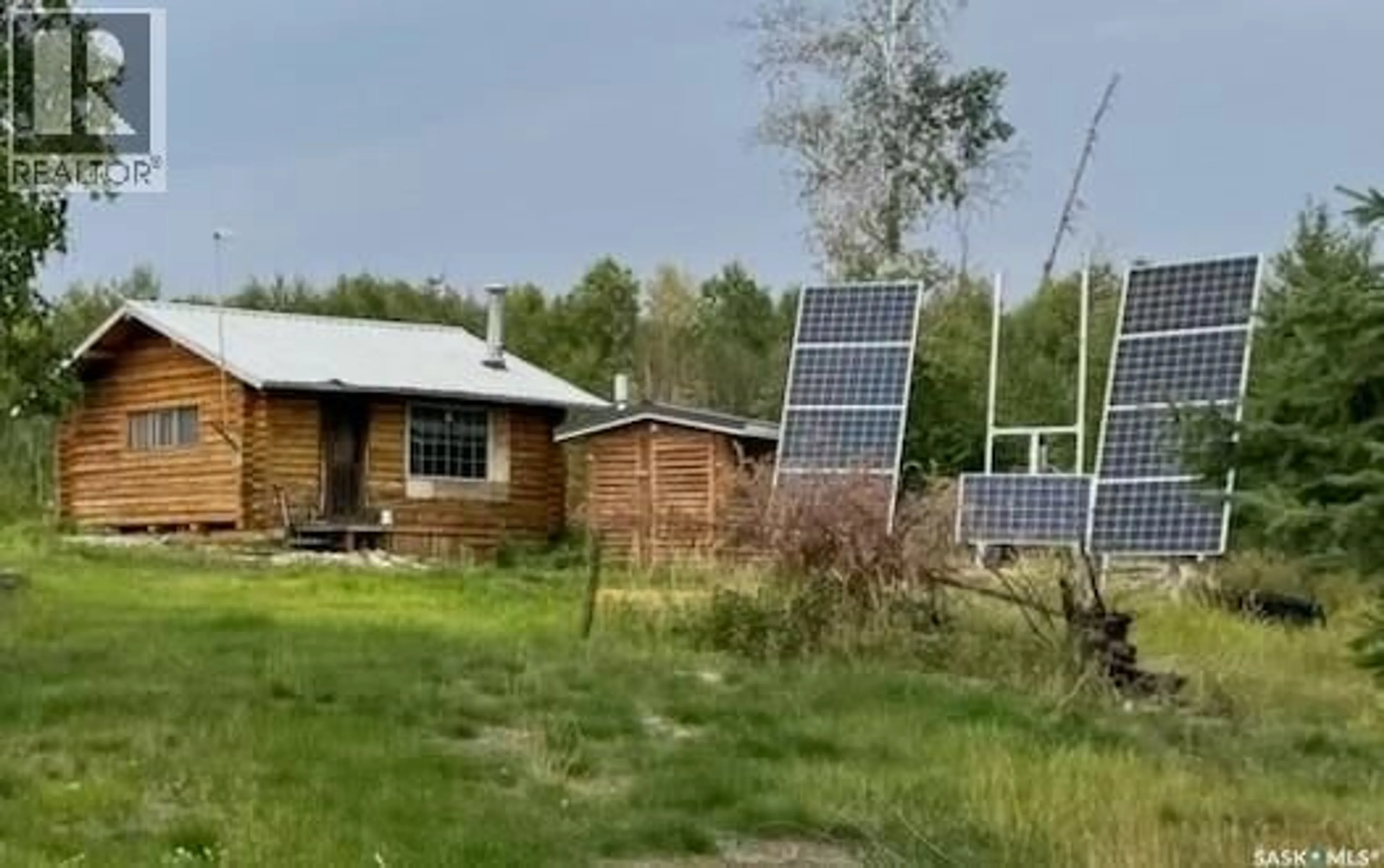 A pic from outside/outdoor area/front of a property/back of a property/a pic from drone, building for CABIN ON ISLAND, Lac La Ronge Provincial Park Saskatchewan S0J1L0