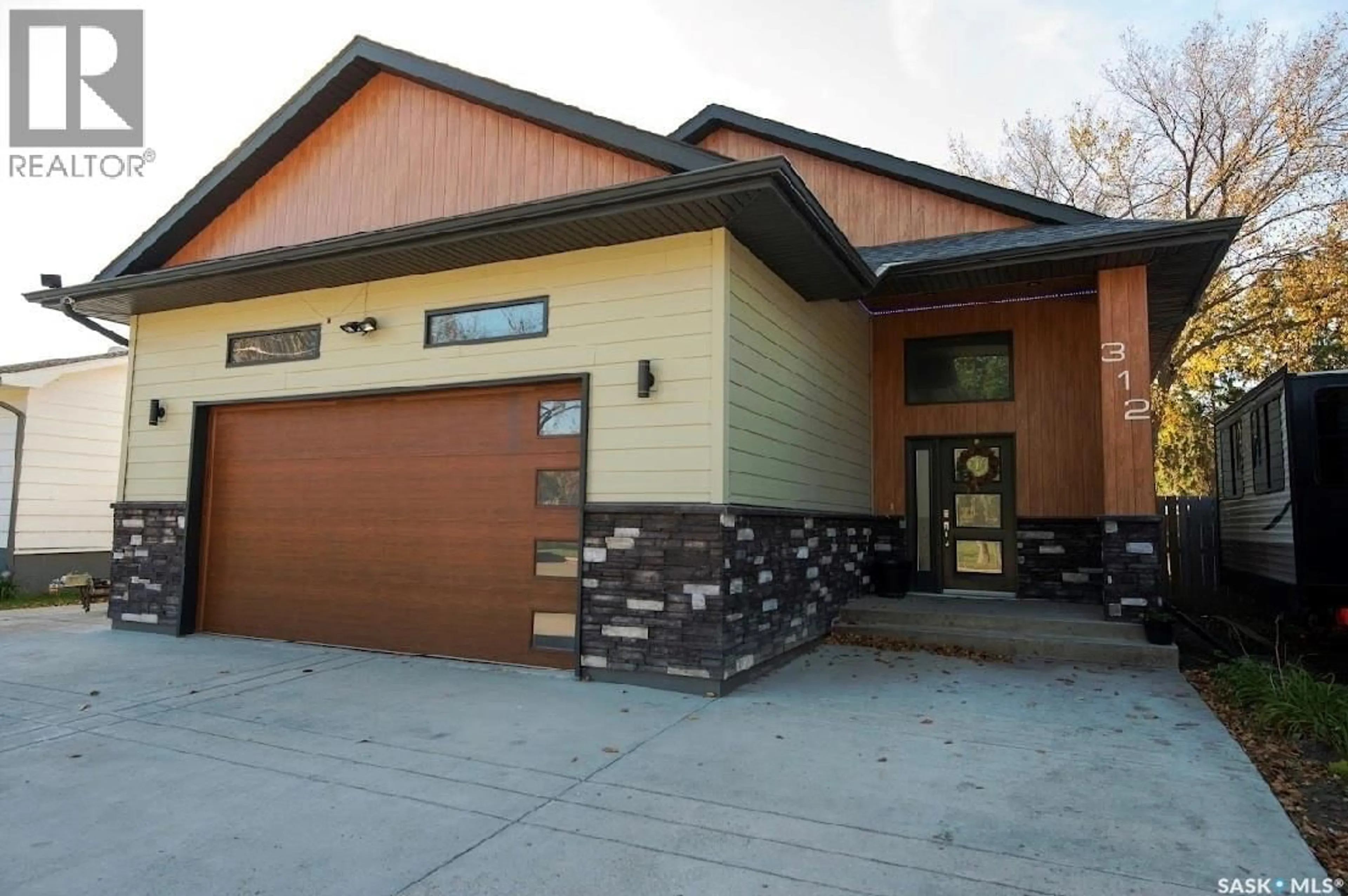 Home with brick exterior material, street for 312 FIRST AVENUE, Yorkton Saskatchewan S3N1K5