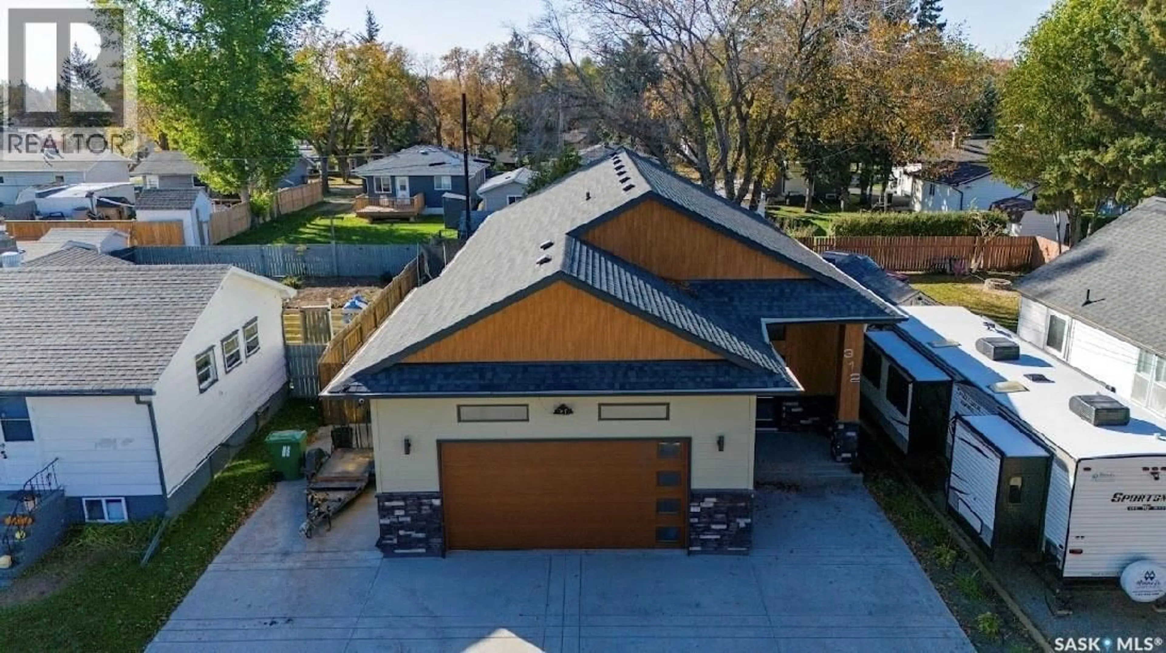 A pic from outside/outdoor area/front of a property/back of a property/a pic from drone, street for 312 FIRST AVENUE, Yorkton Saskatchewan S3N1K5