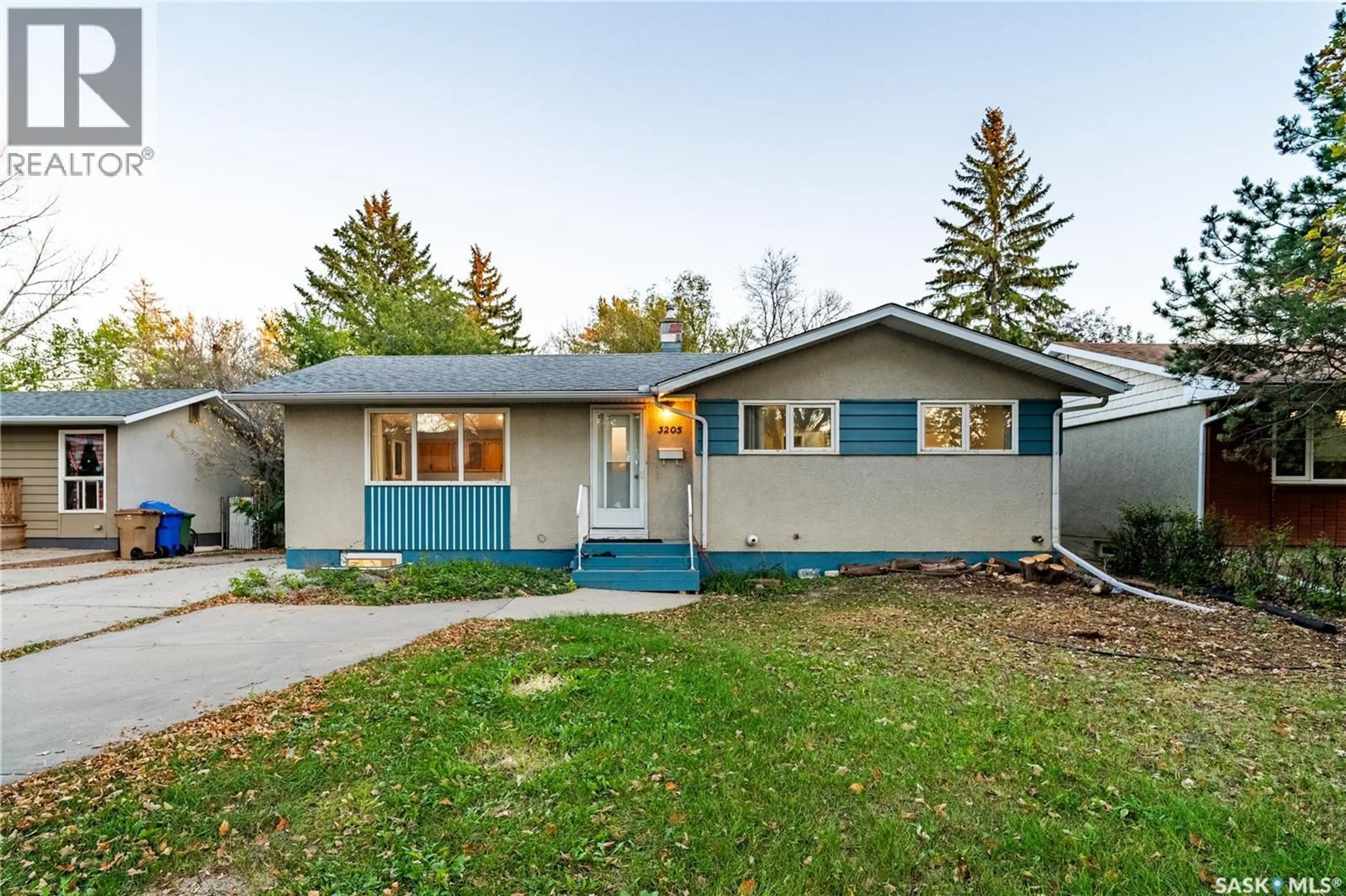 Home with vinyl exterior material, street for 3205 GRANT ROAD, Regina Saskatchewan S4S5H3