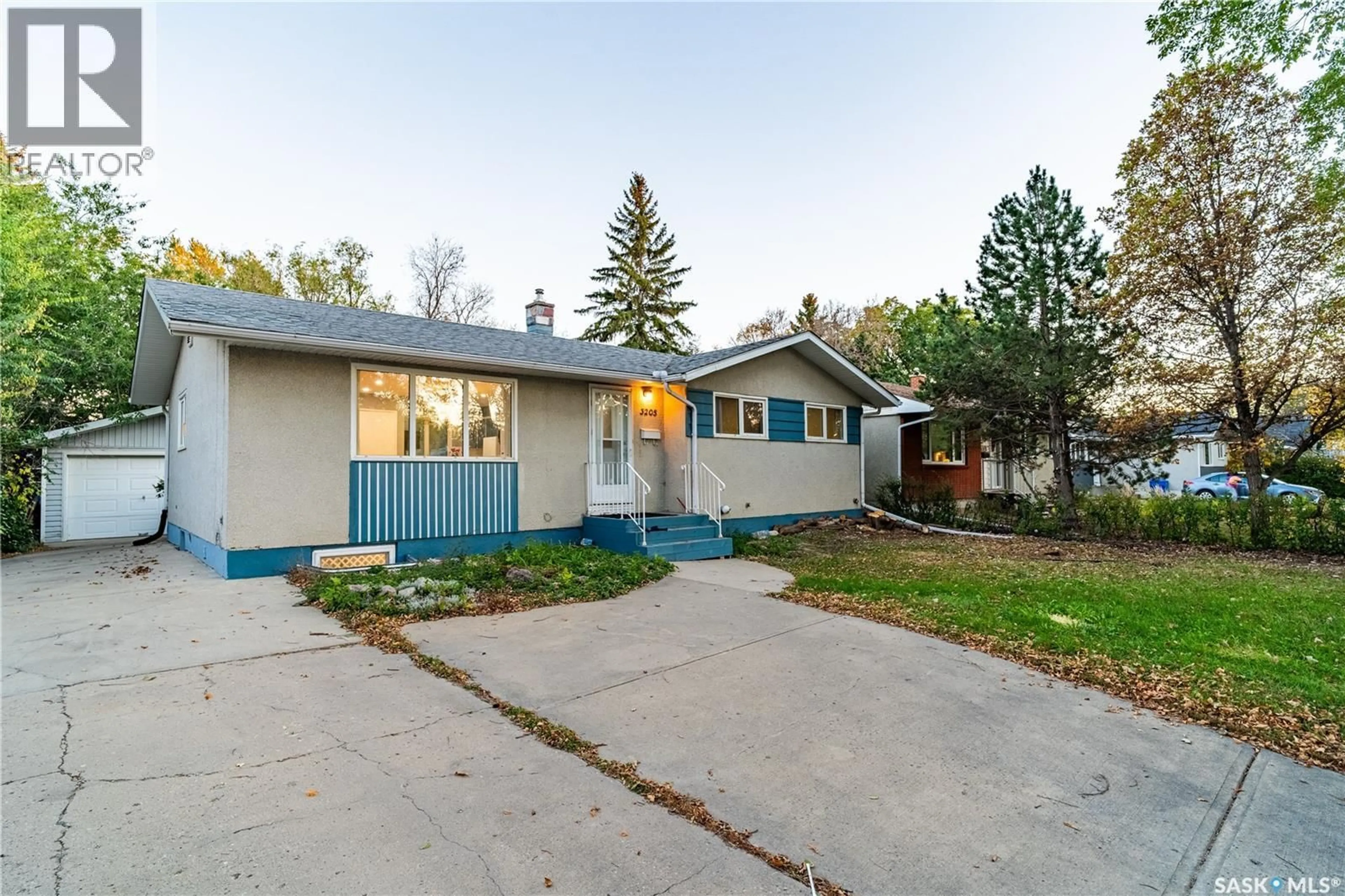 Home with vinyl exterior material, street for 3205 GRANT ROAD, Regina Saskatchewan S4S5H3