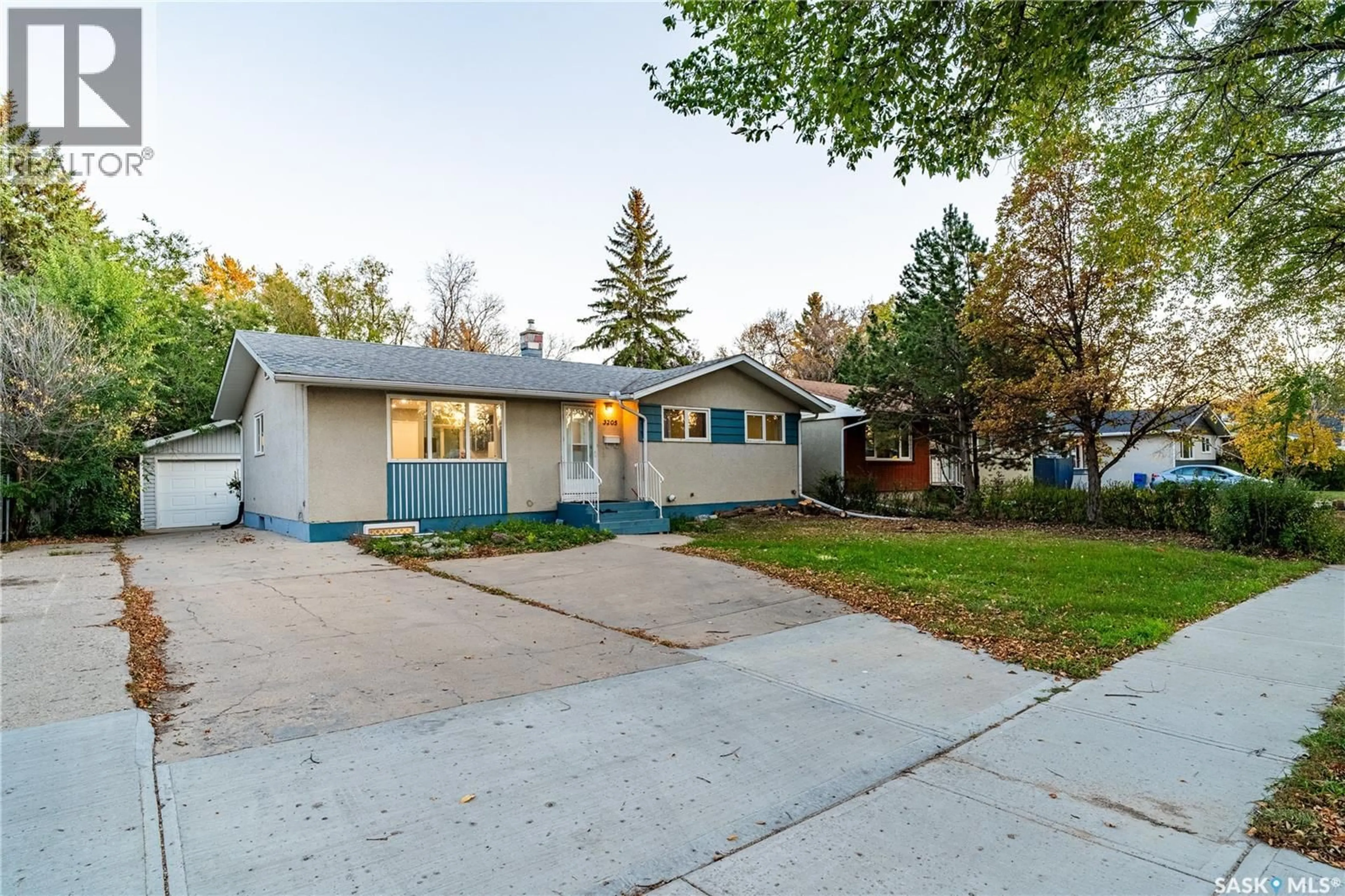 Home with vinyl exterior material, street for 3205 GRANT ROAD, Regina Saskatchewan S4S5H3