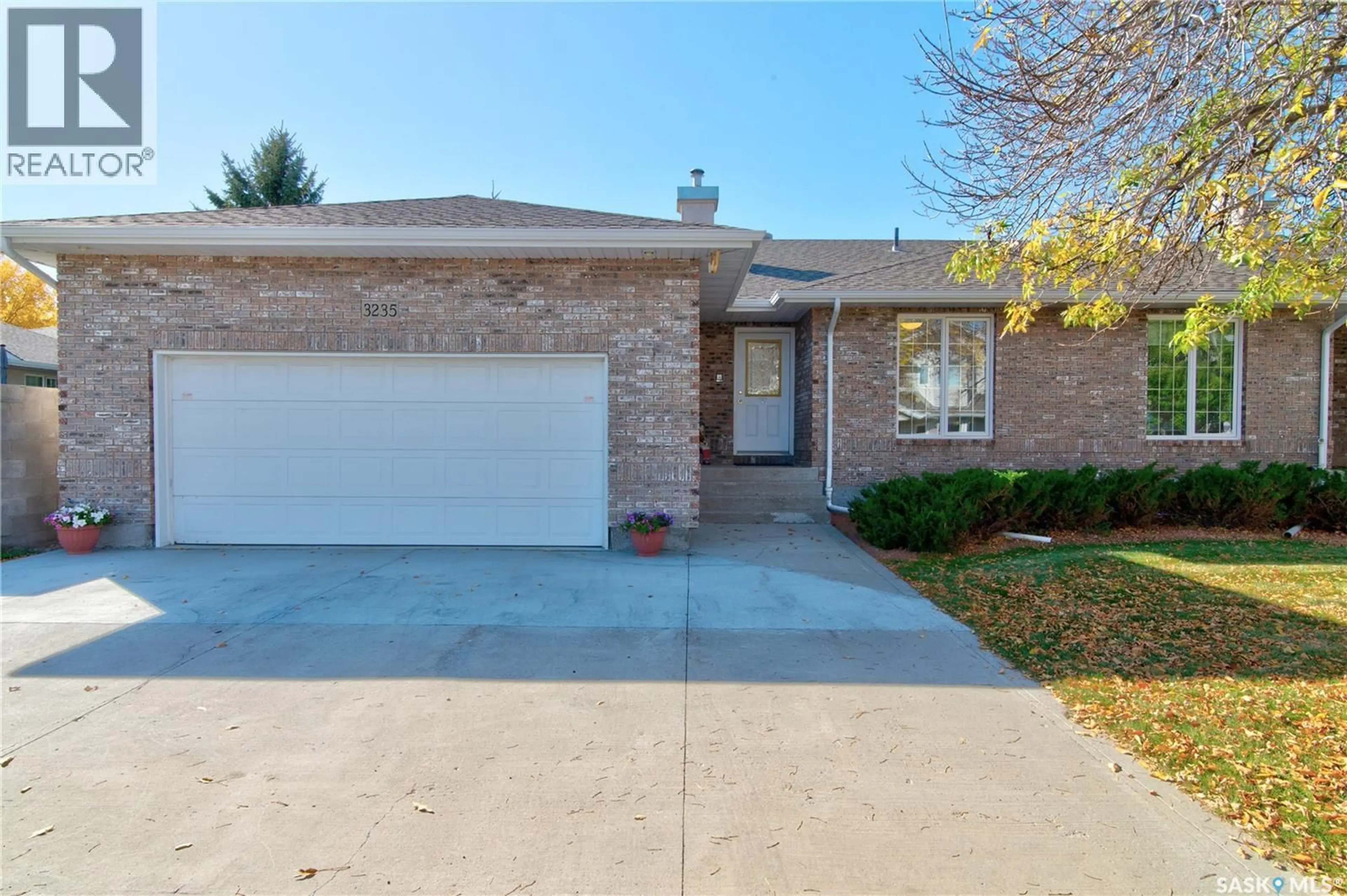 Home with brick exterior material, street for 3235 RENFREW CRESCENT, Regina Saskatchewan S4V2W6
