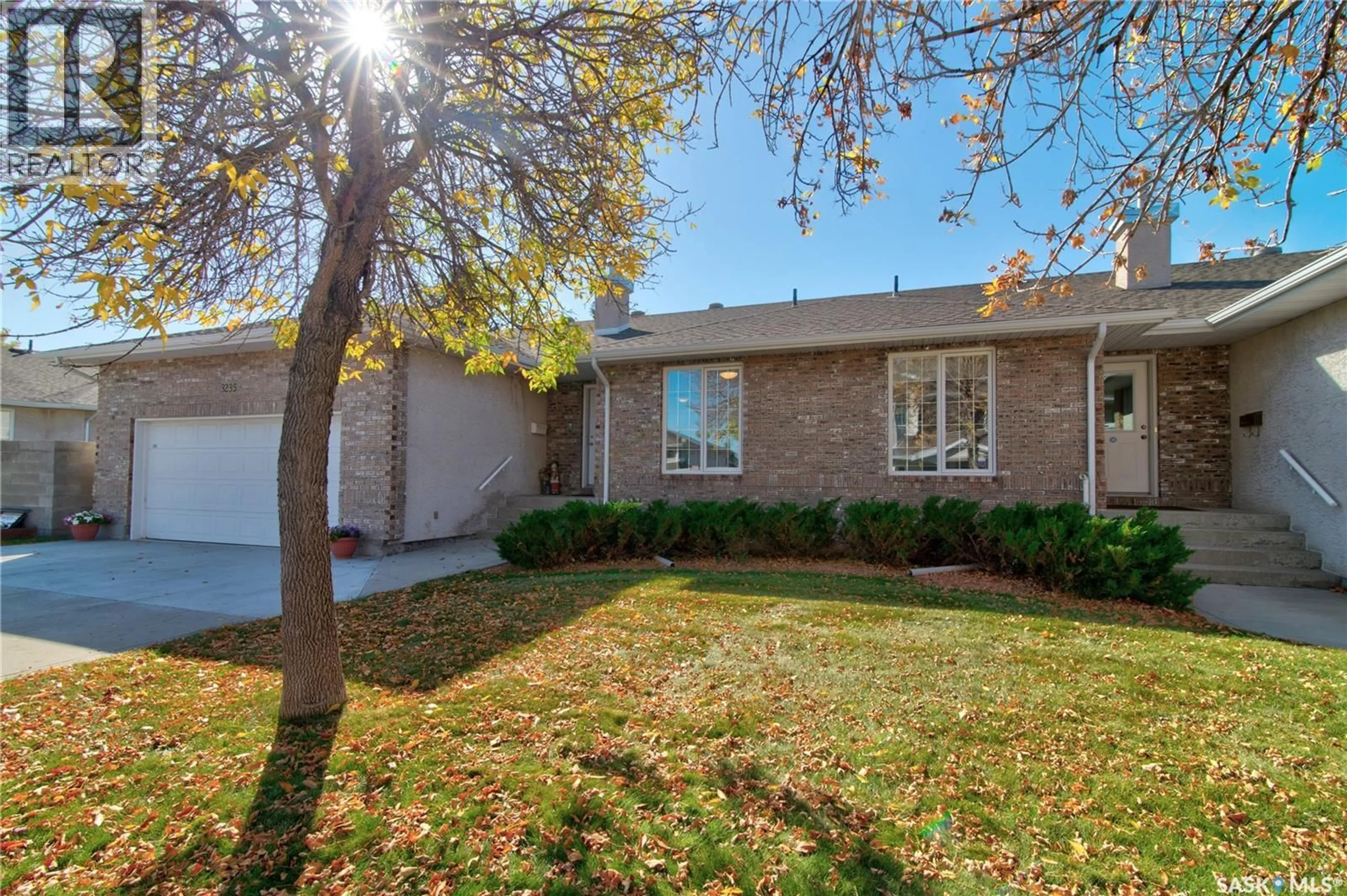 Home with brick exterior material, street for 3235 RENFREW CRESCENT, Regina Saskatchewan S4V2W6