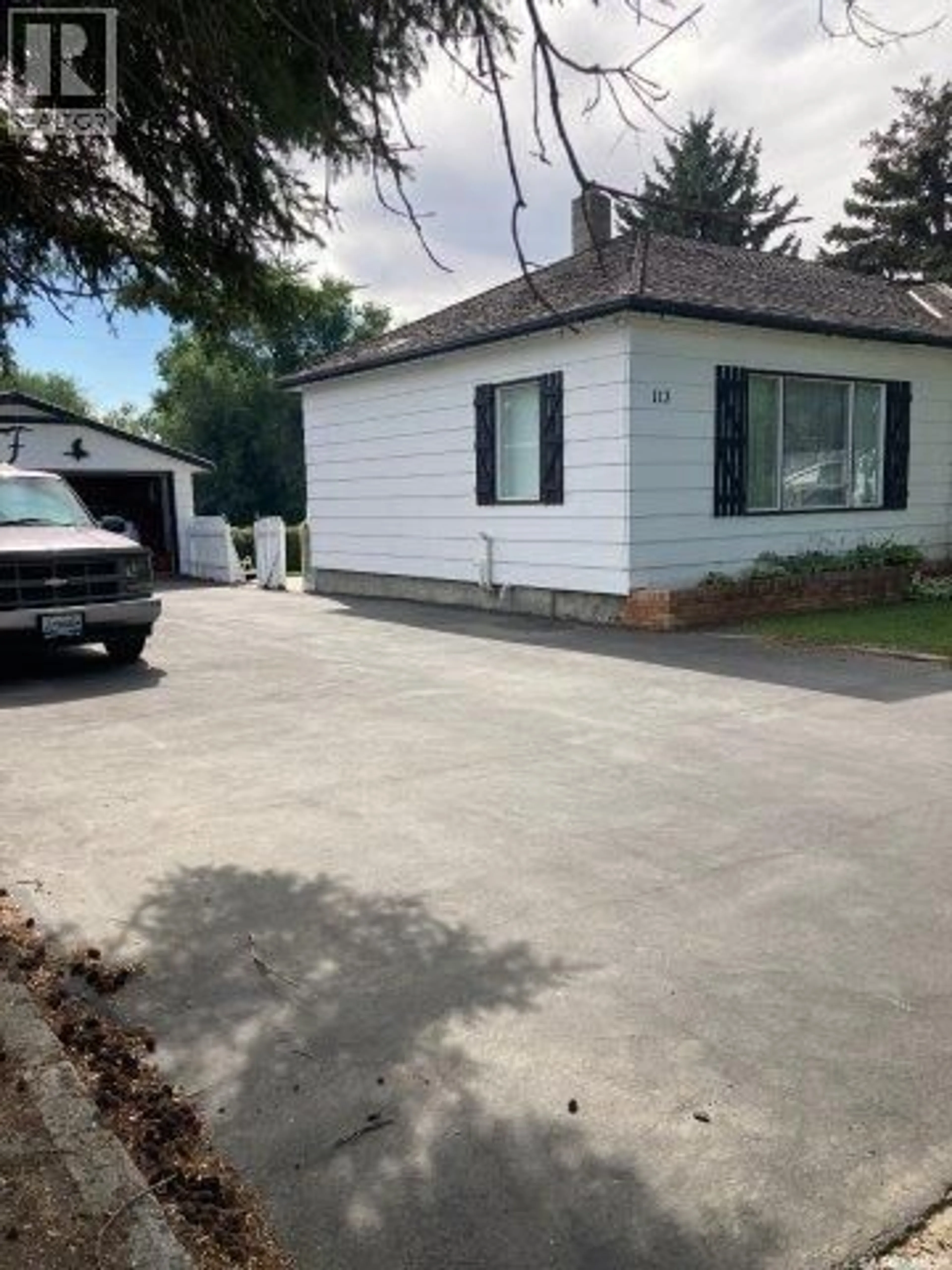 Home with vinyl exterior material, street for 113 4TH AVENUE, Ituna Saskatchewan S0A1N0