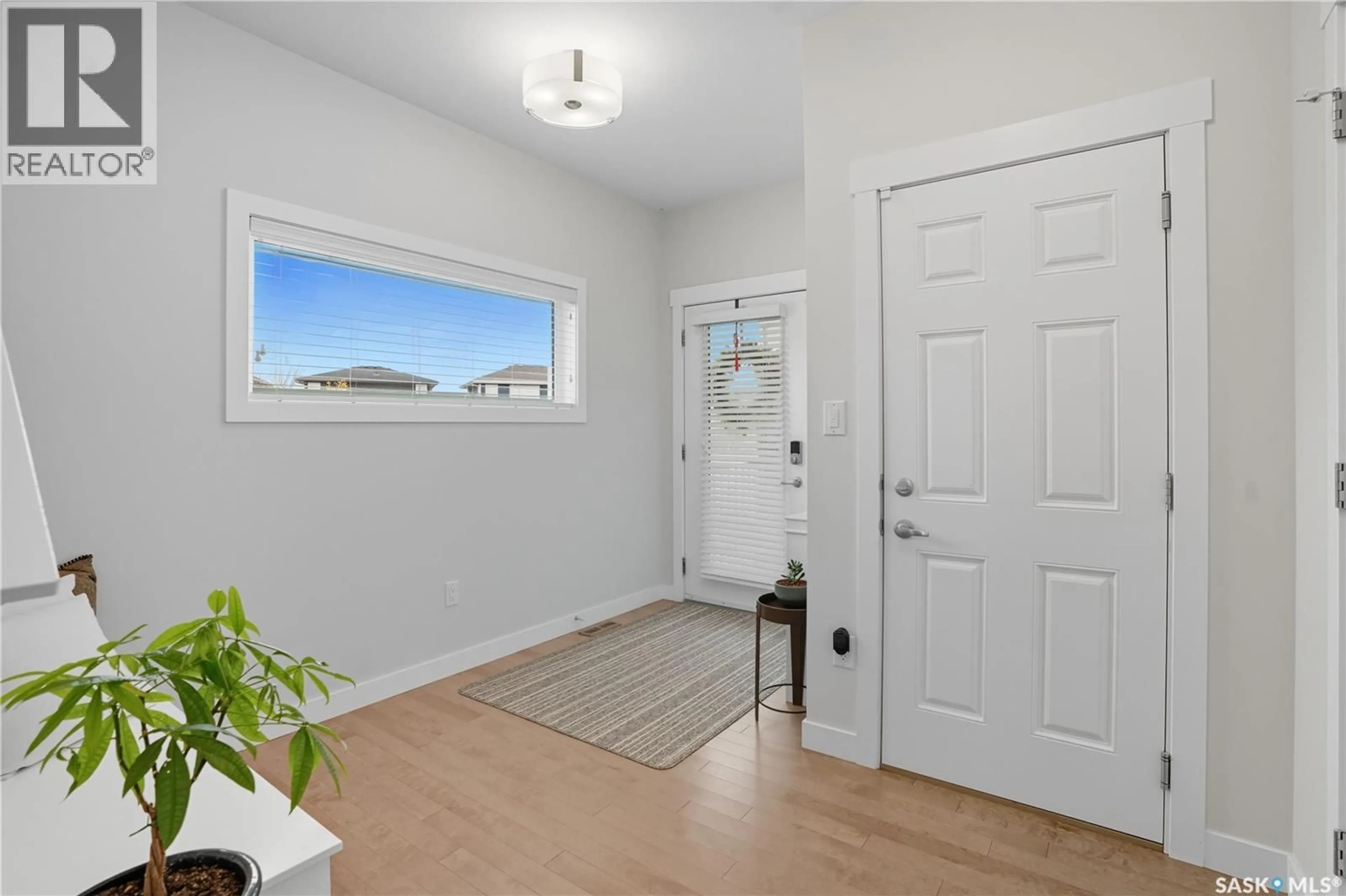 Indoor entryway for 303 DAGNONE CRESCENT, Saskatoon Saskatchewan S7V0P7