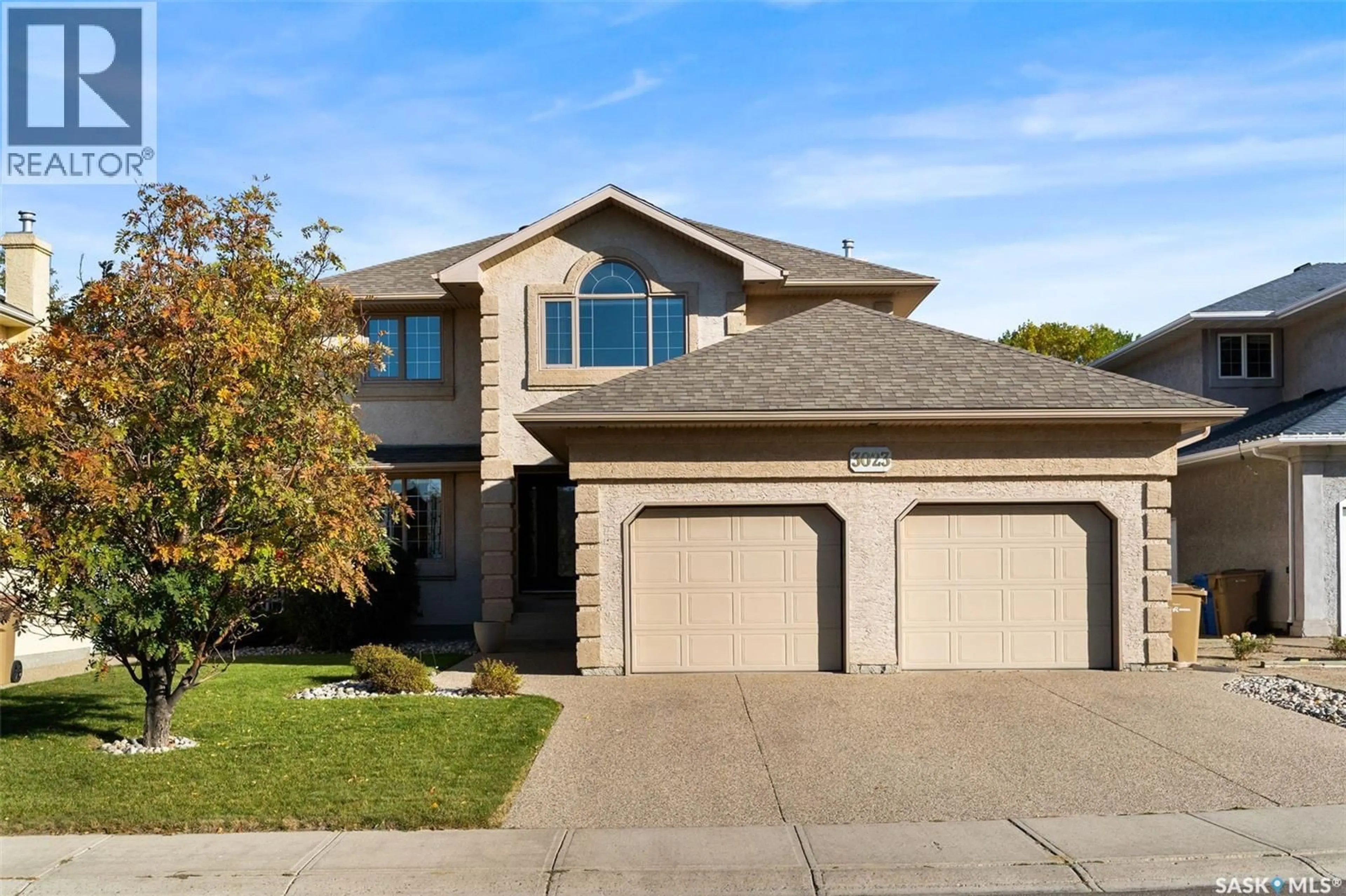 Home with brick exterior material, street for 3023 WIMBLEDON DRIVE, Regina Saskatchewan S4V2Y2