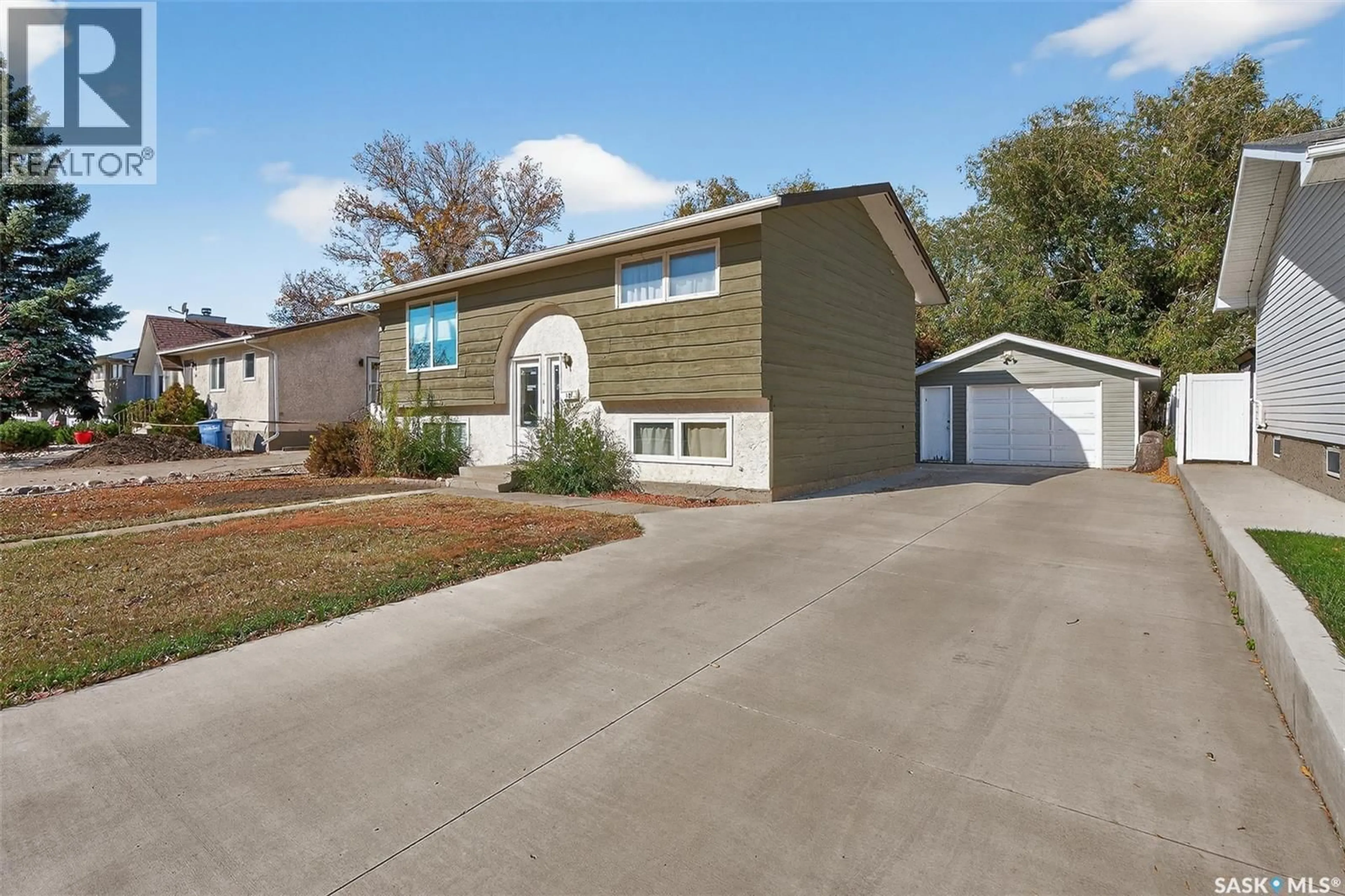 Home with vinyl exterior material, street for 12 BUTTERCUP CRESCENT, Moose Jaw Saskatchewan S6J1A4