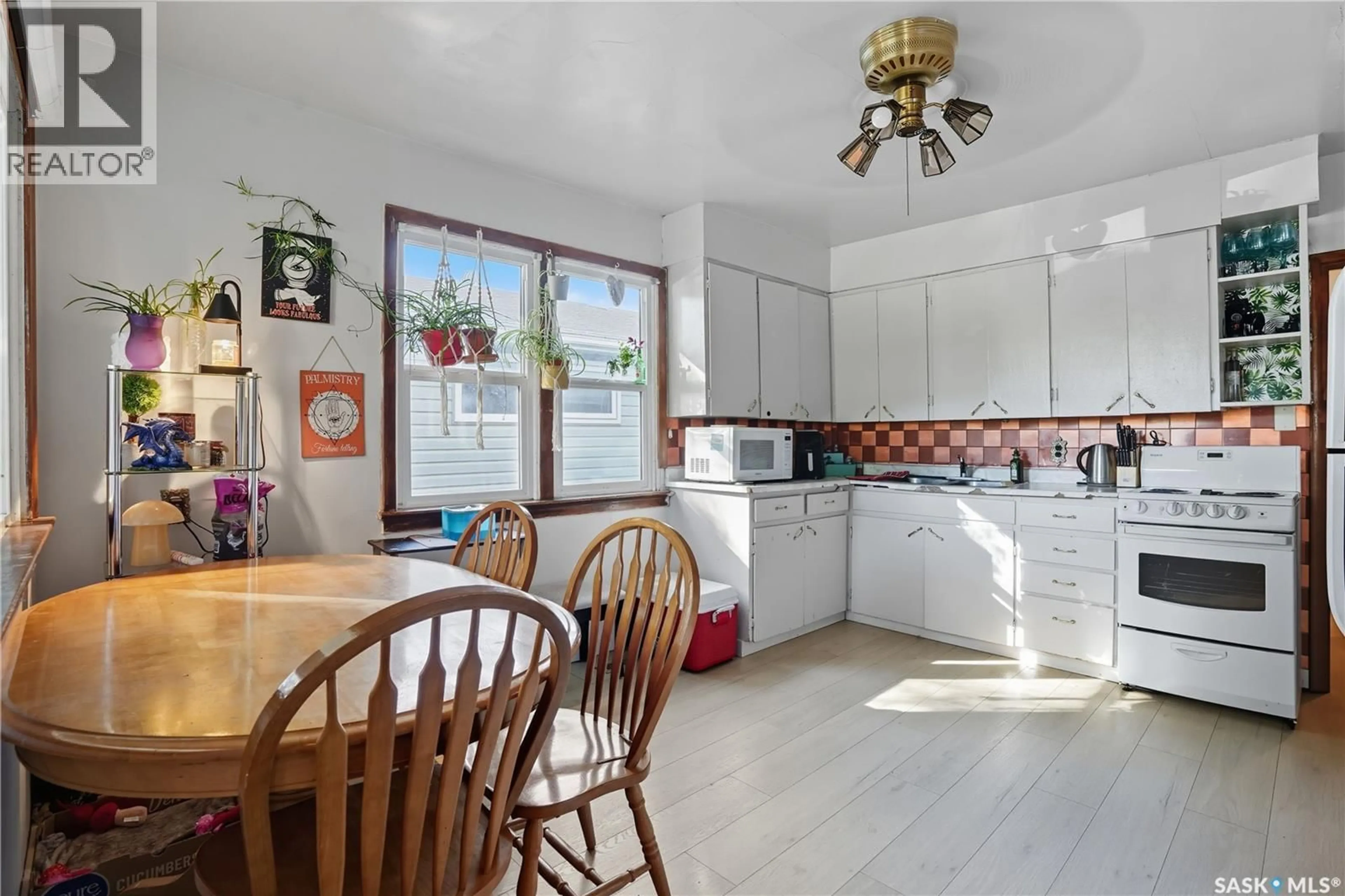 Open concept kitchen, ceramic/tile floor for 2440 MCARA STREET, Regina Saskatchewan S4N2W5