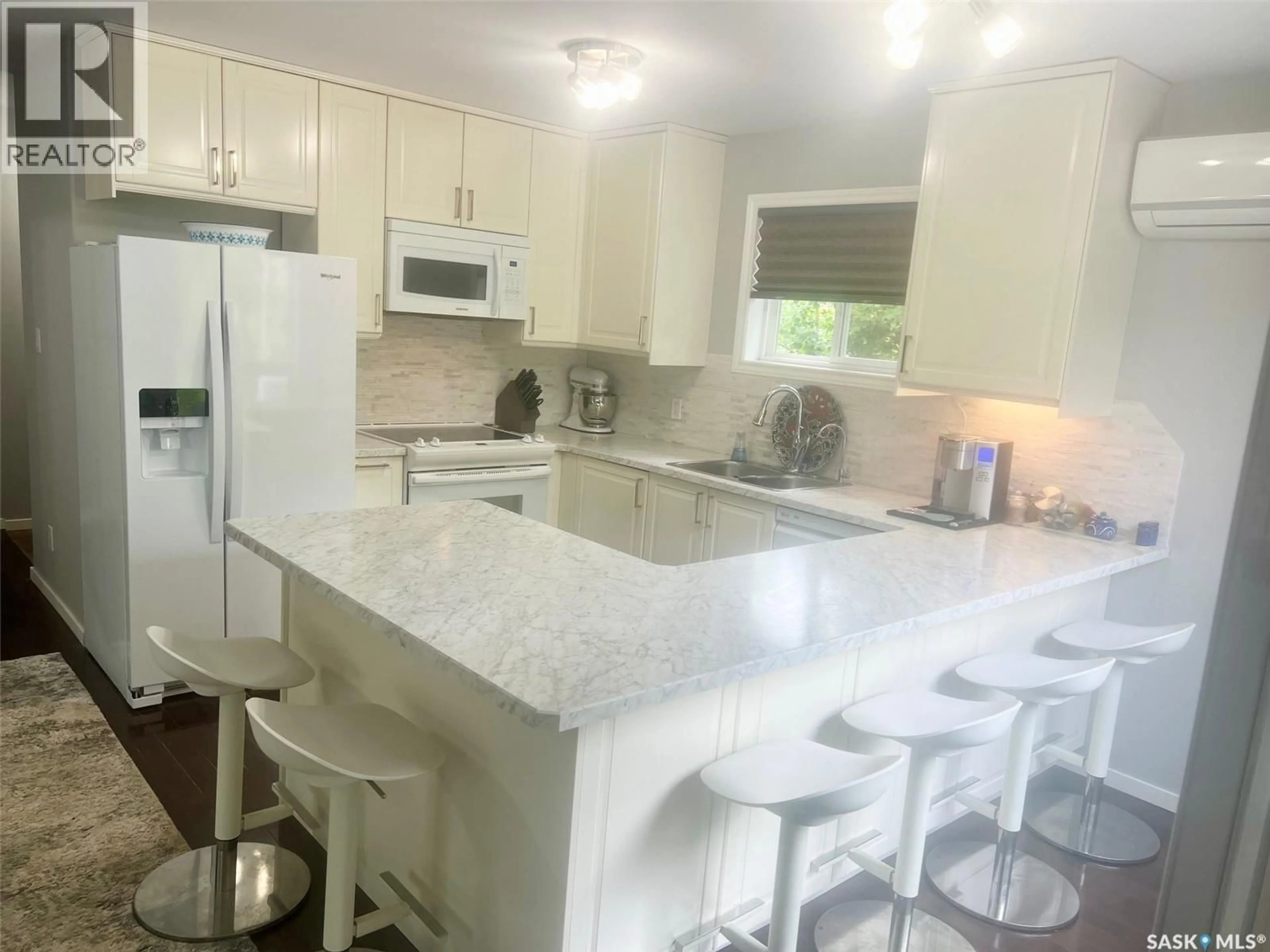 Open concept kitchen, ceramic/tile floor for 408 OLDROYD DRIVE, Good Spirit Lake Saskatchewan S0A0L0