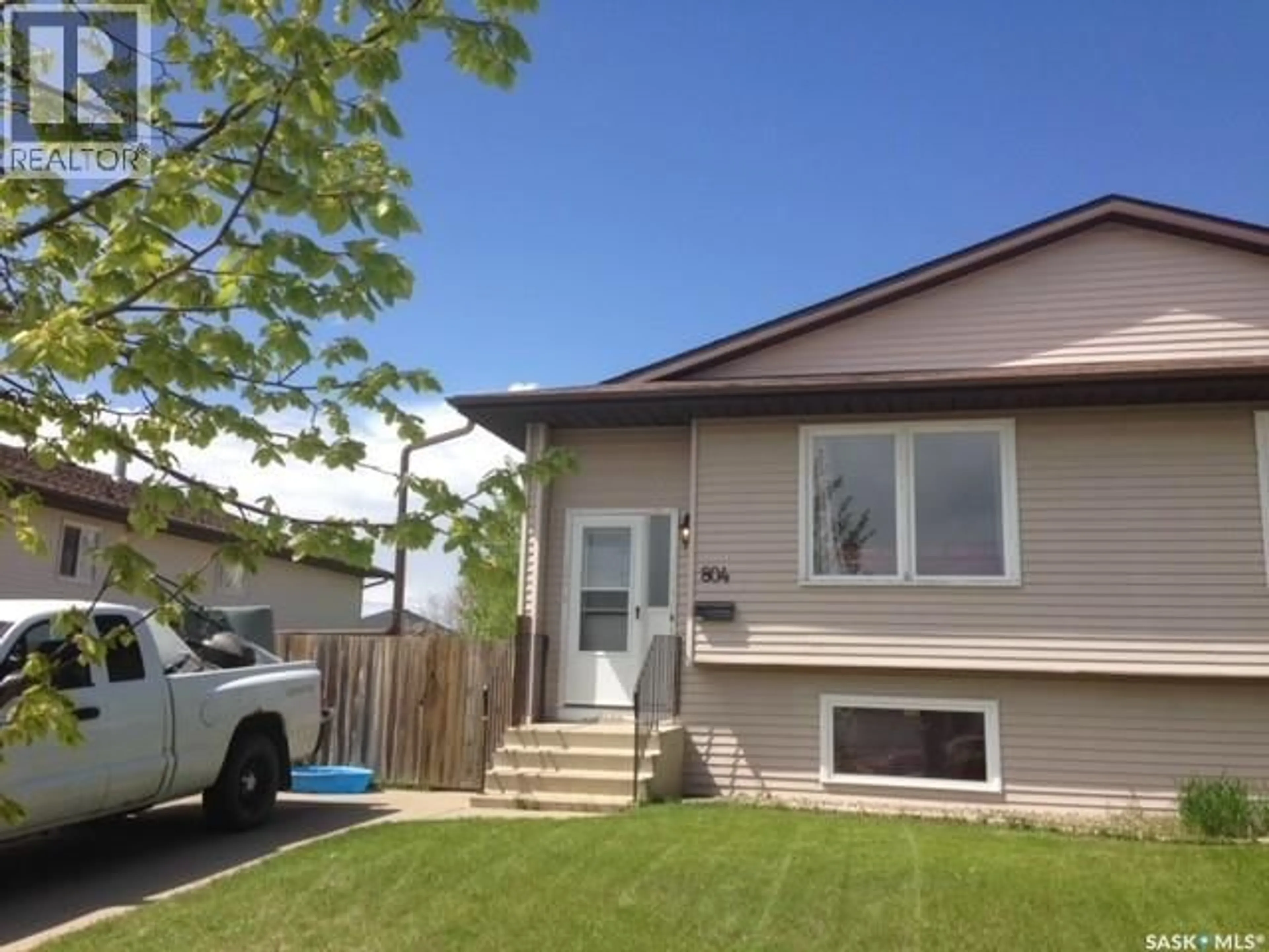 Home with vinyl exterior material, street for 804 MCCORMACK ROAD, Saskatoon Saskatchewan S7M5K1