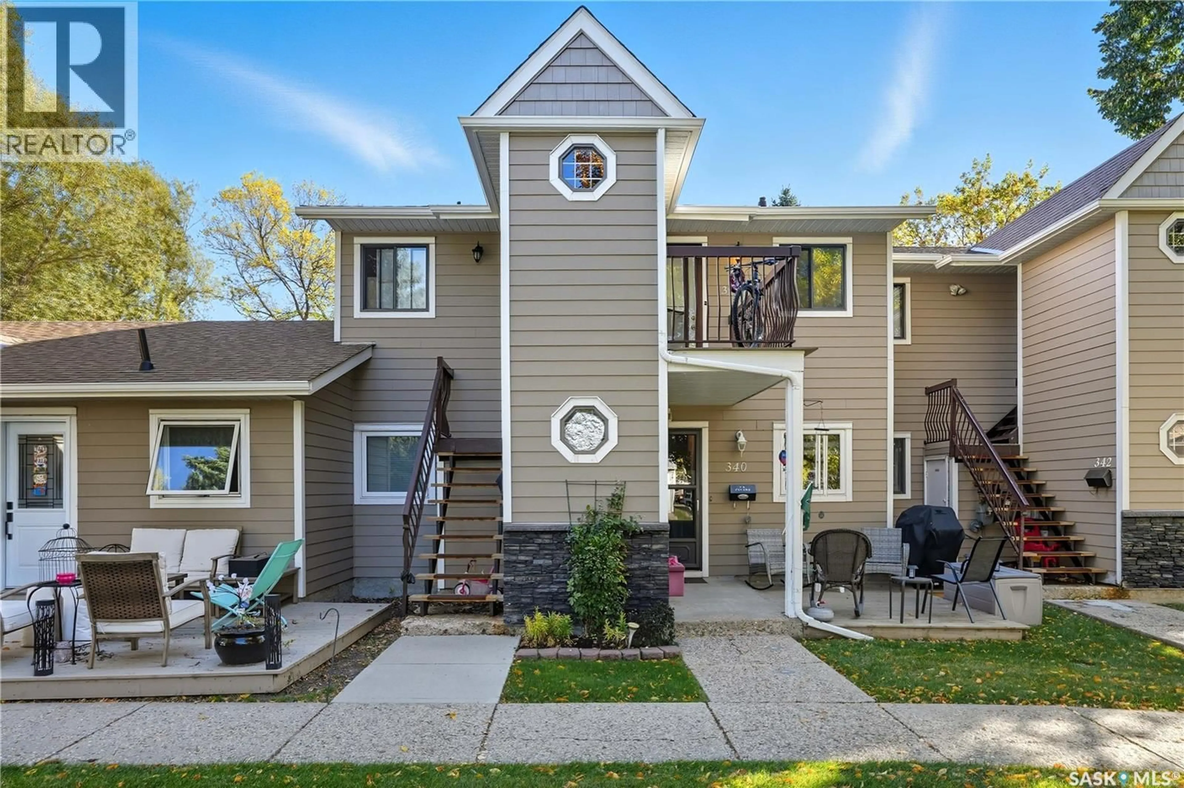 Home with vinyl exterior material, street for 338 CEDAR MEADOW DRIVE, Regina Saskatchewan S4X3J5