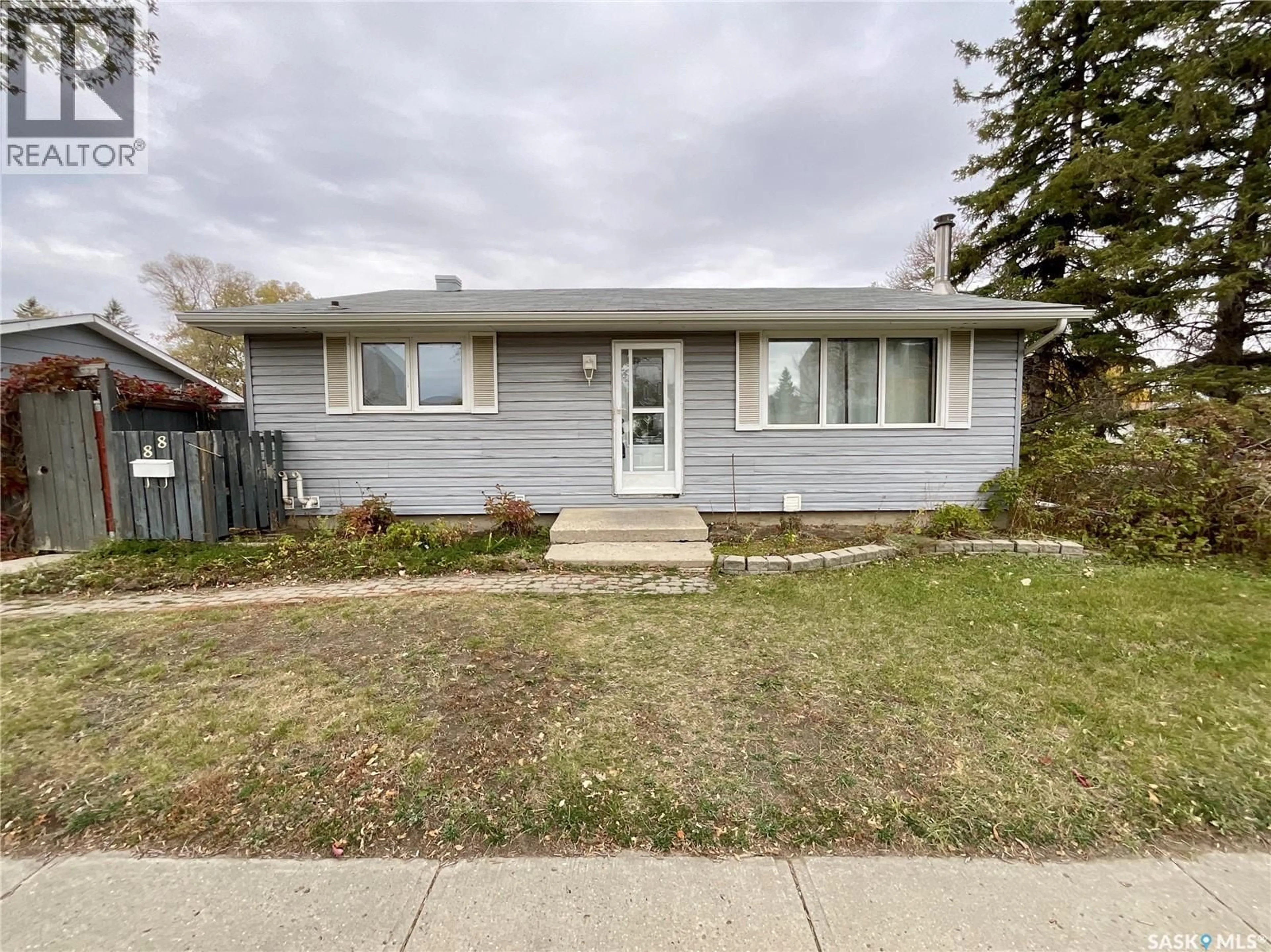Home with vinyl exterior material, street for 88 CAMBRIDGE AVENUE, Regina Saskatchewan S4N0L1
