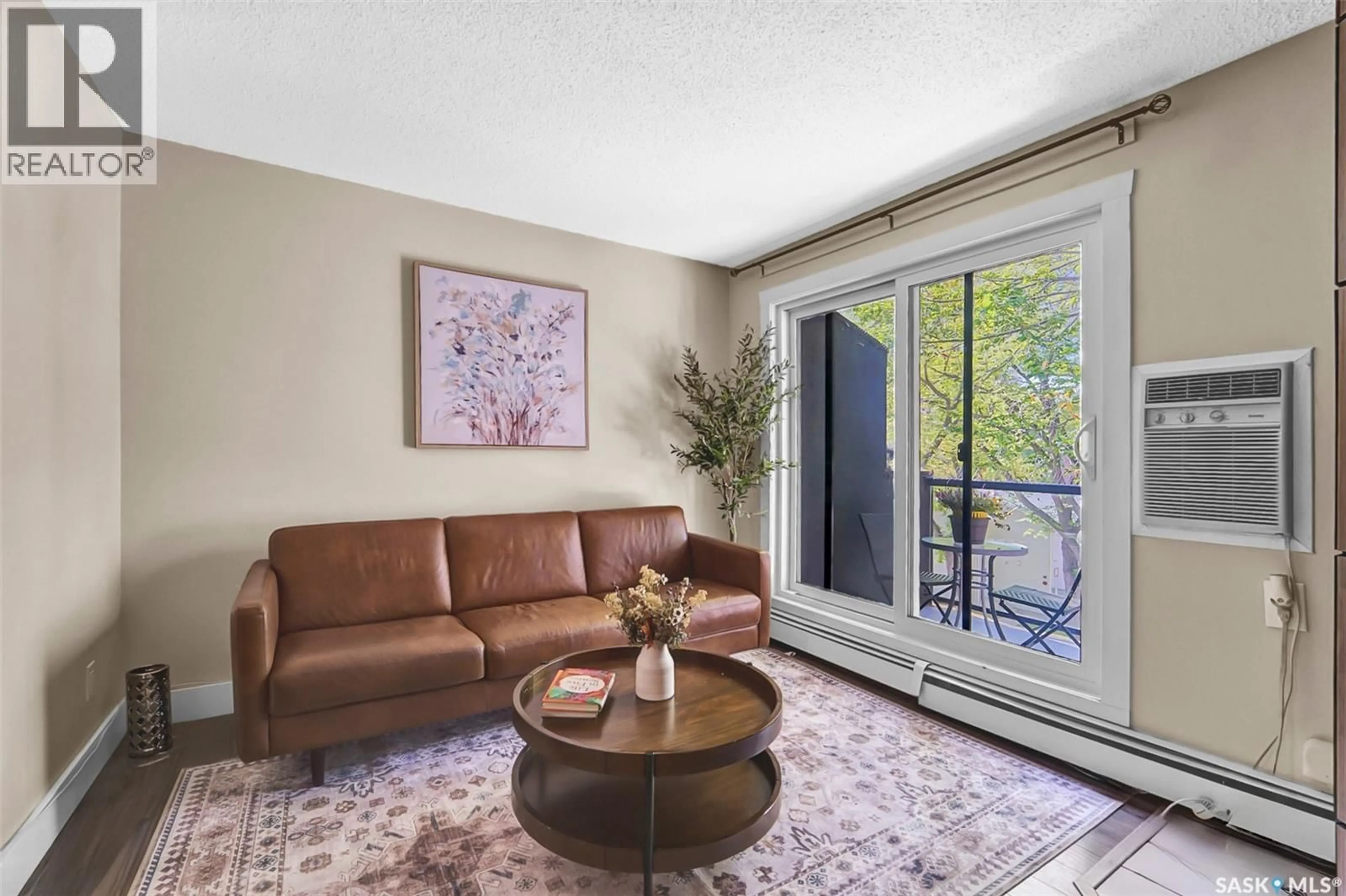 Living room with furniture, unknown for 512 - 401 4TH AVENUE N, Saskatoon Saskatchewan S7K2M3