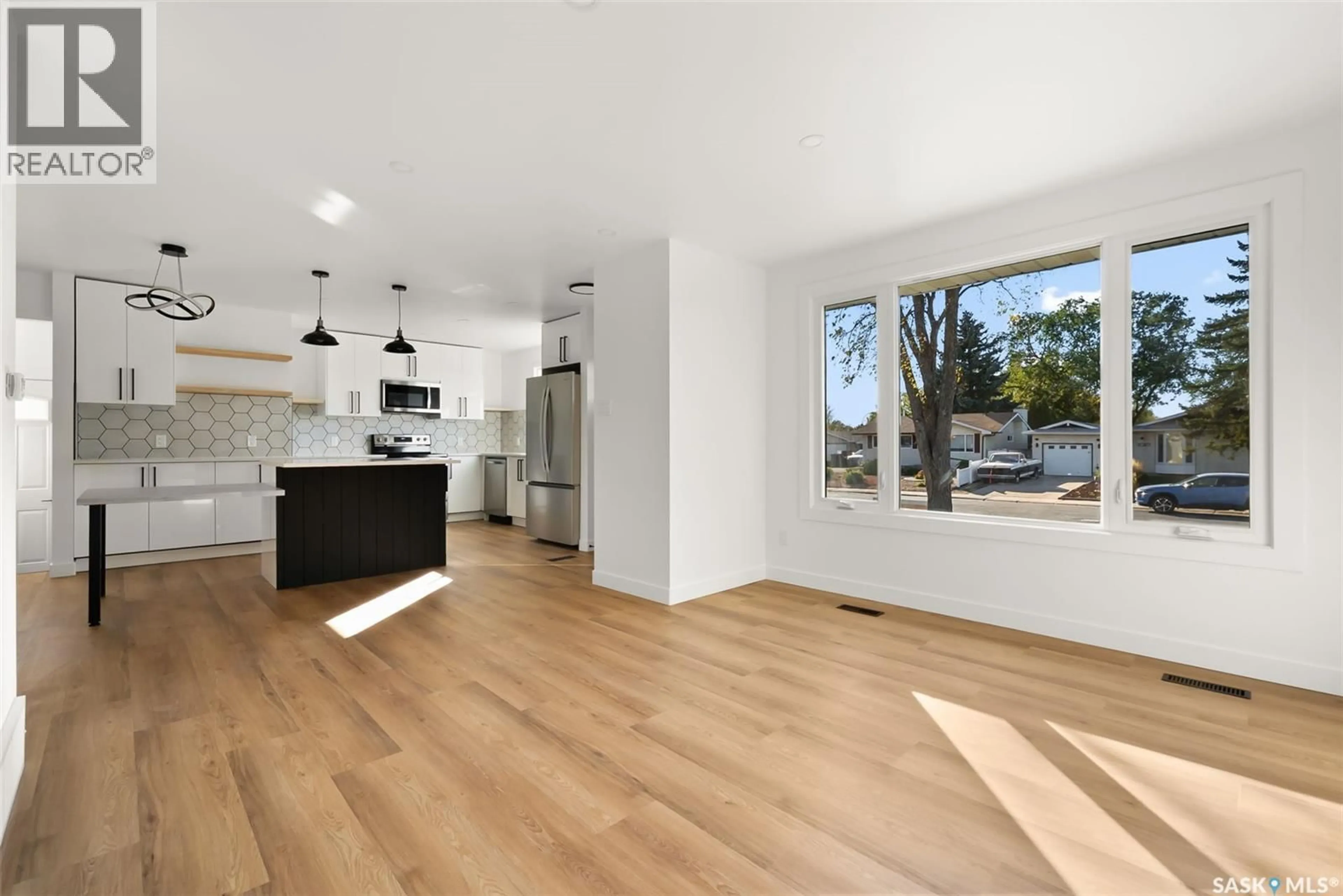 Open concept kitchen, wood/laminate floor for 39 BOYCE STREET, Regina Saskatchewan S4R6M3