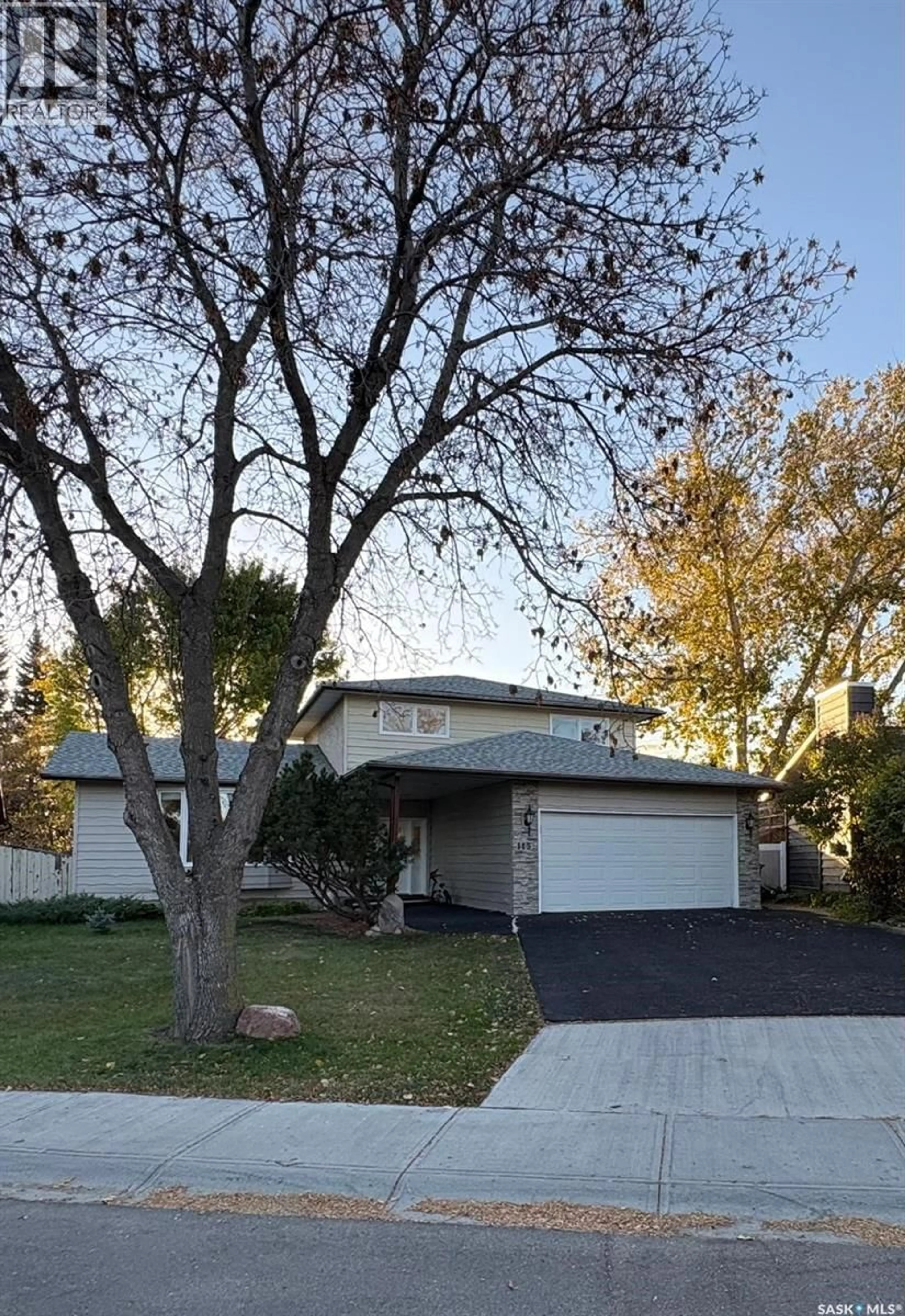 Home with vinyl exterior material, street for 115 FUHRMANN CRESCENT, Regina Saskatchewan S4R7W2